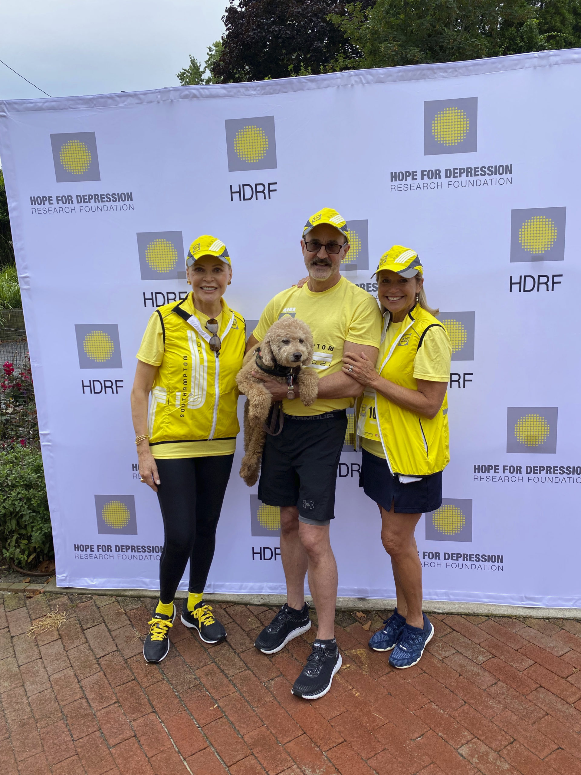 Audrey Gruss, Arthur Dunnam and Katie Couric at the Race for Hope run at Agawam Park.  GREG D'ELIA