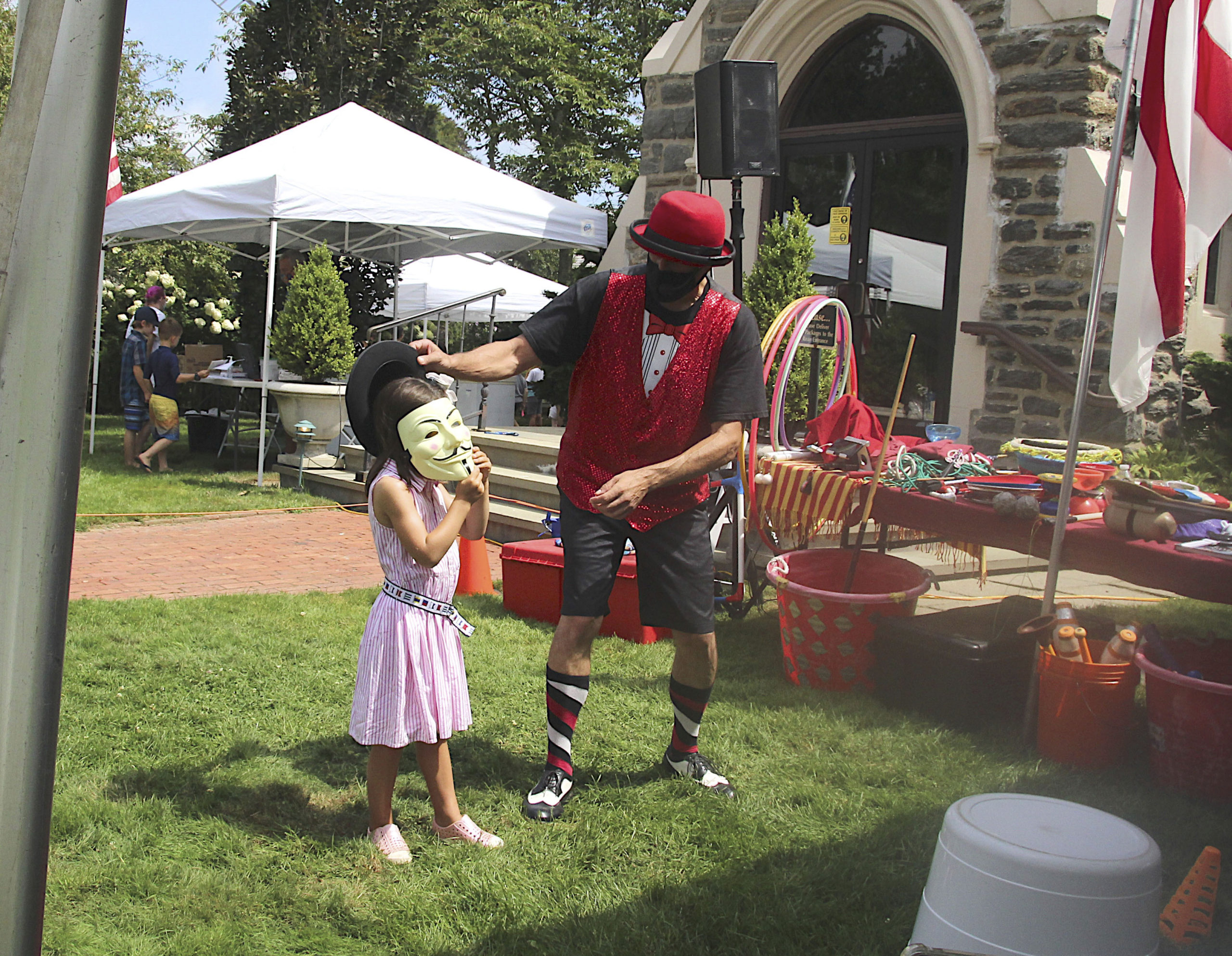 Magic Keith performs at the St. Luke's Episcopal Church Fair on Saturday.  KYRIL BROMLEY