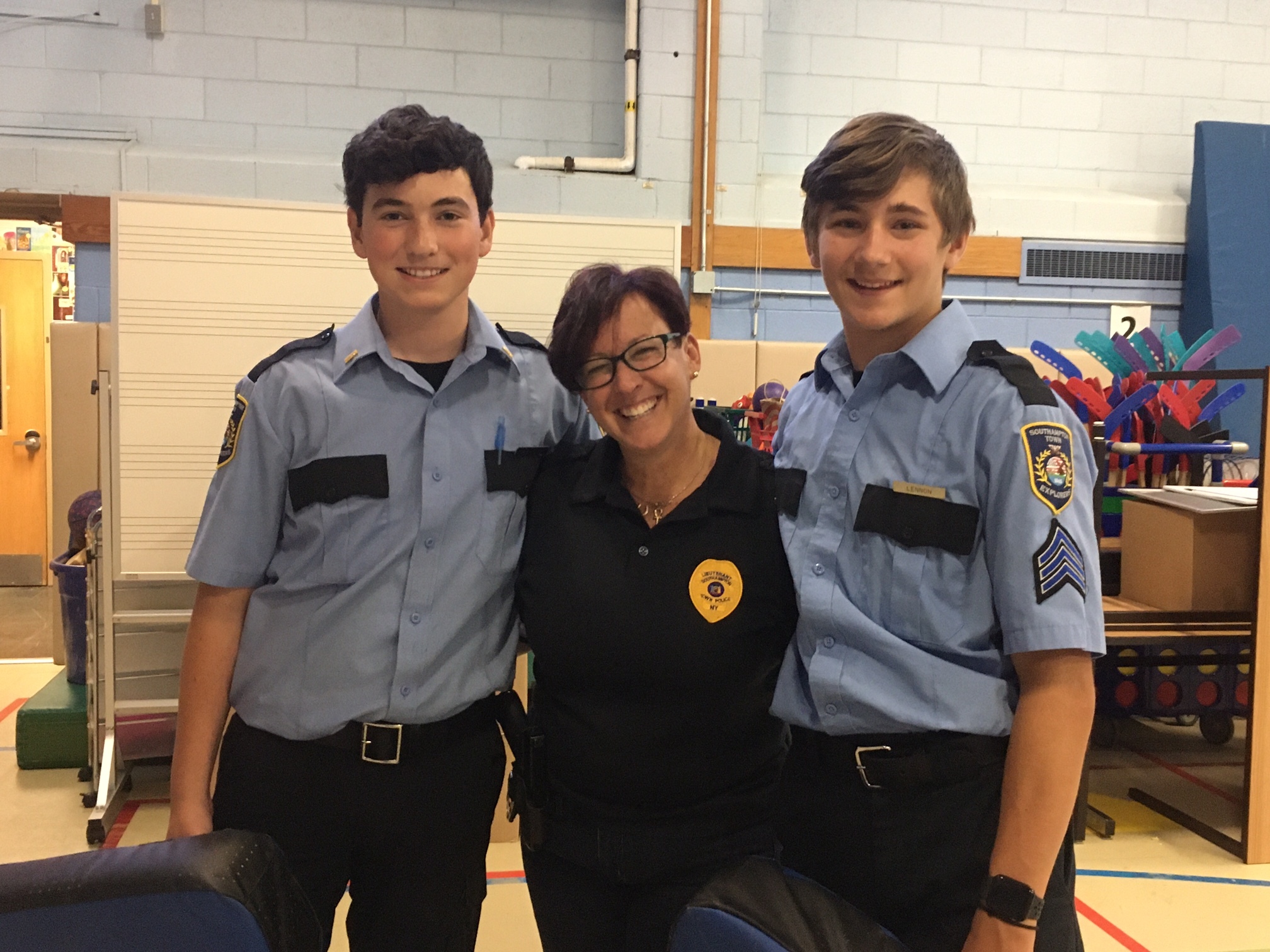 Lt. Sue Ralph with Explorers Sgt John Lennon and Lt. Hunter Wicklund.