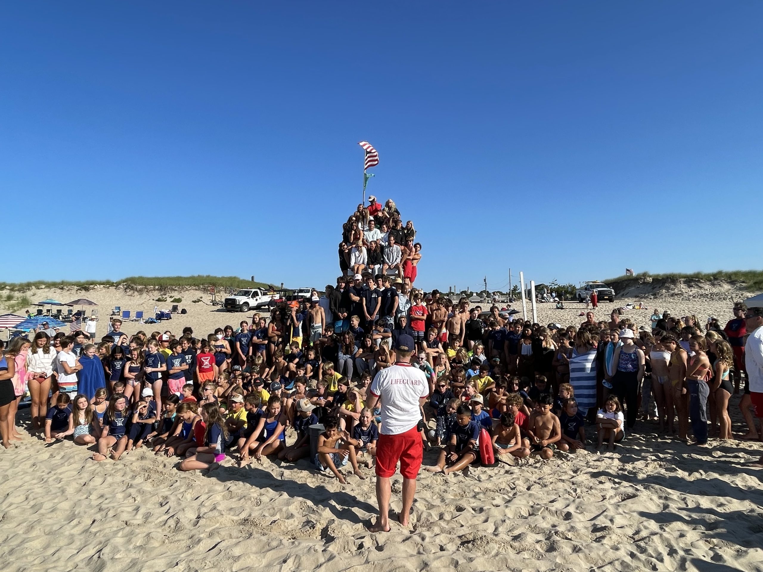 East Hampton Town’s head lifeguard, John Ryan Jr., speaks to junior lifeguards and their instructors prior to last weekend’s tournament at Indian Wells Beach in Amagansett.