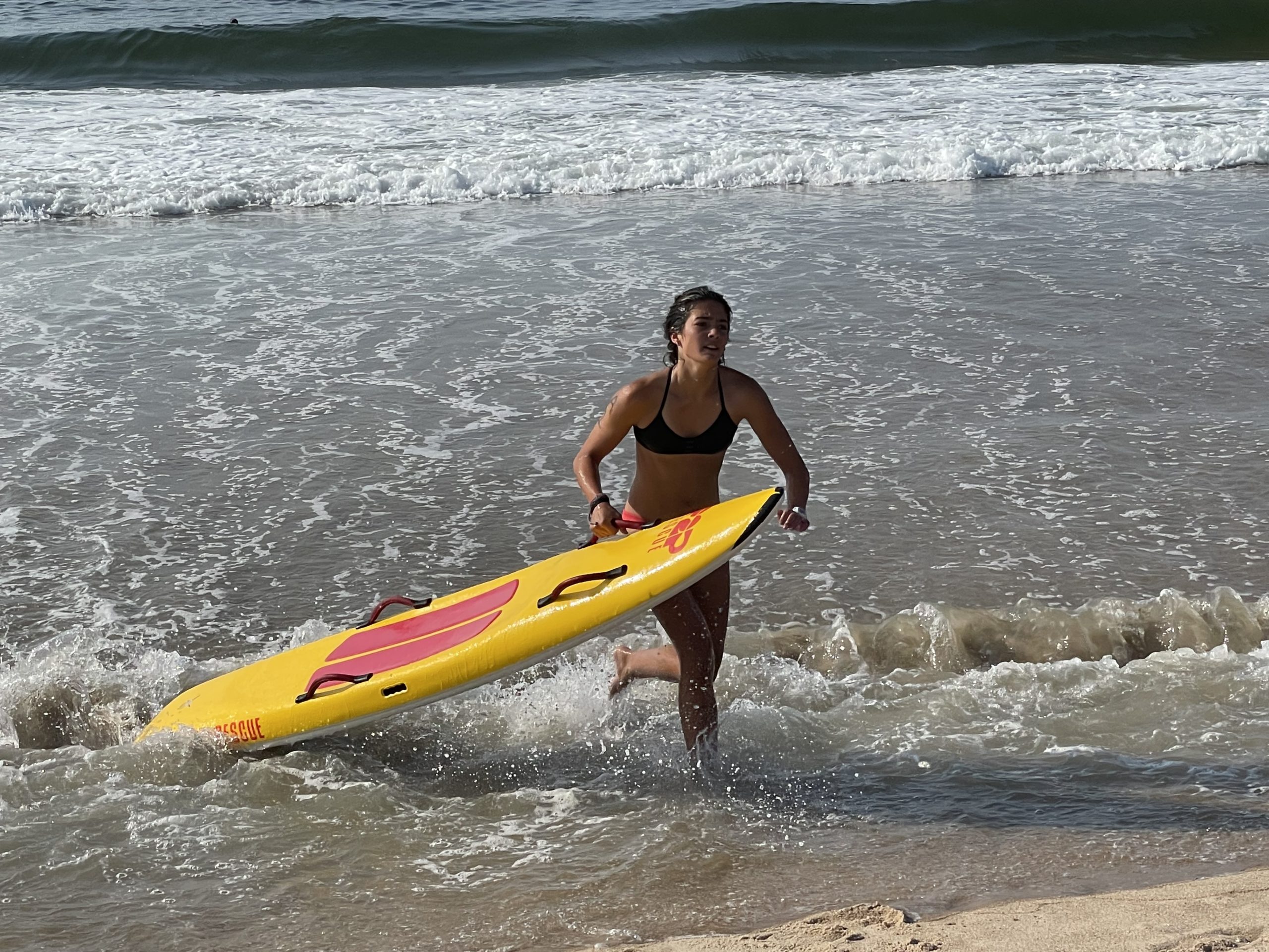 Melina Sarlo exits the water during the Ironguard event.