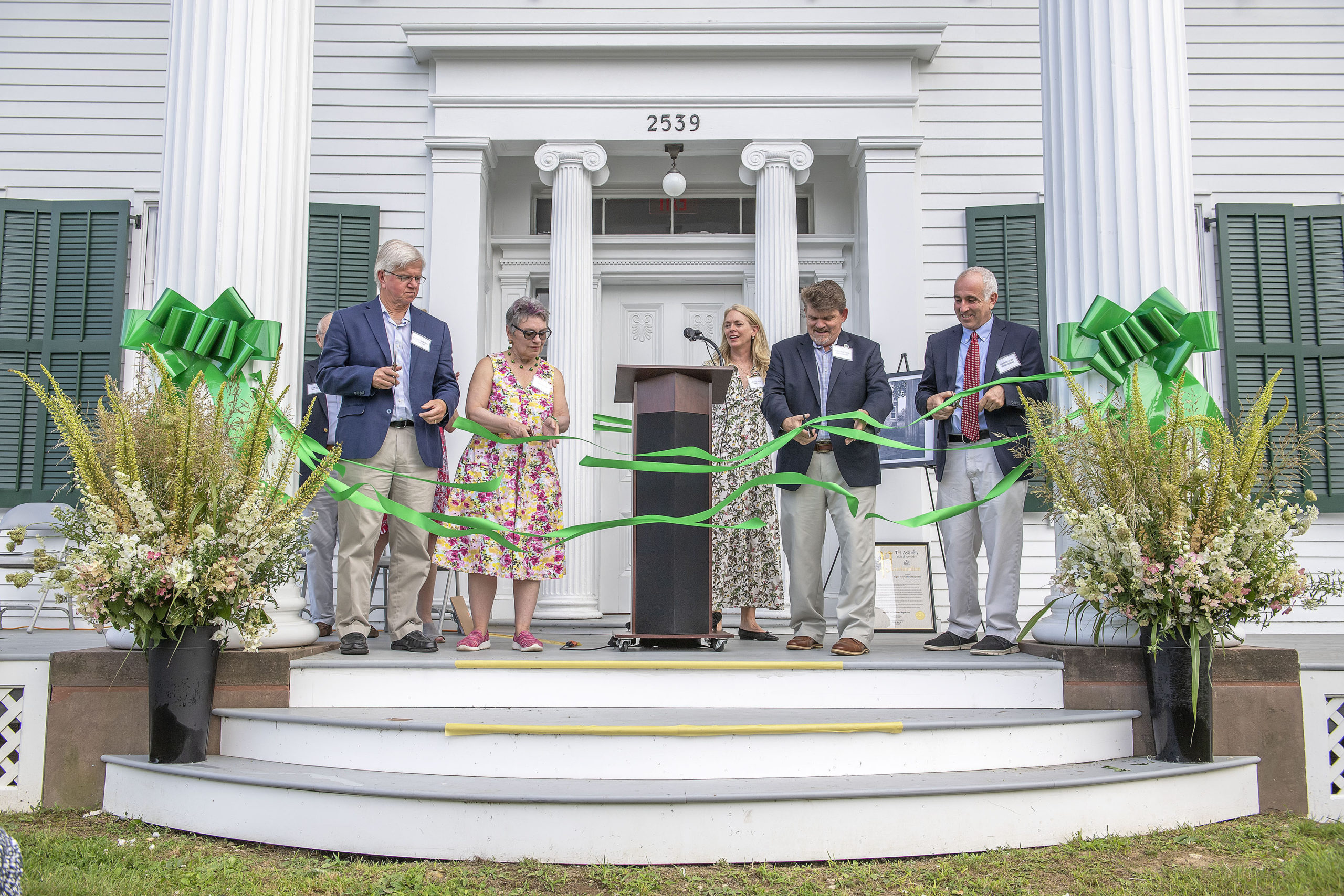 New York State Assemblyman Fred Thiele, Community Preservation Fund Manager Lisa Kombrink, Southampton Town Board Board Member Tommy John Schiavoni and Southampton Town Supervisor Jay Schneiderman cut the ribbon(s) during a ceremony that was held to inaugurate the new, completely refurbished Nathaniel Rogers House at the corner of Ocean Road and Montauk Highway on Sunday.   MICHAEL HELLER