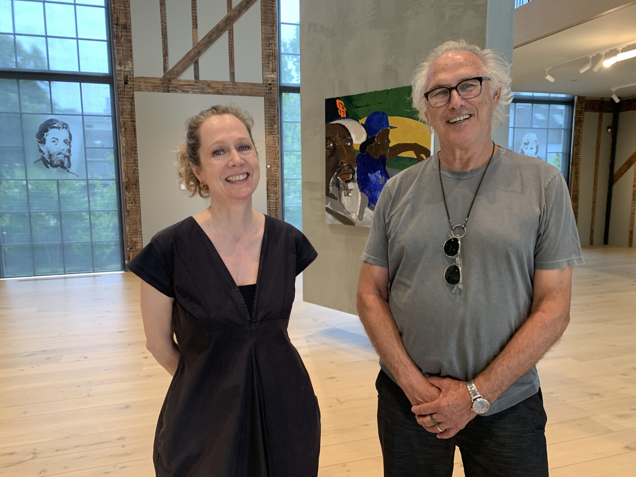 The Church's Executive Director Sara Cochran and founder Eric Fischl during a recent visit to the newly opened Sag Harbor art space.