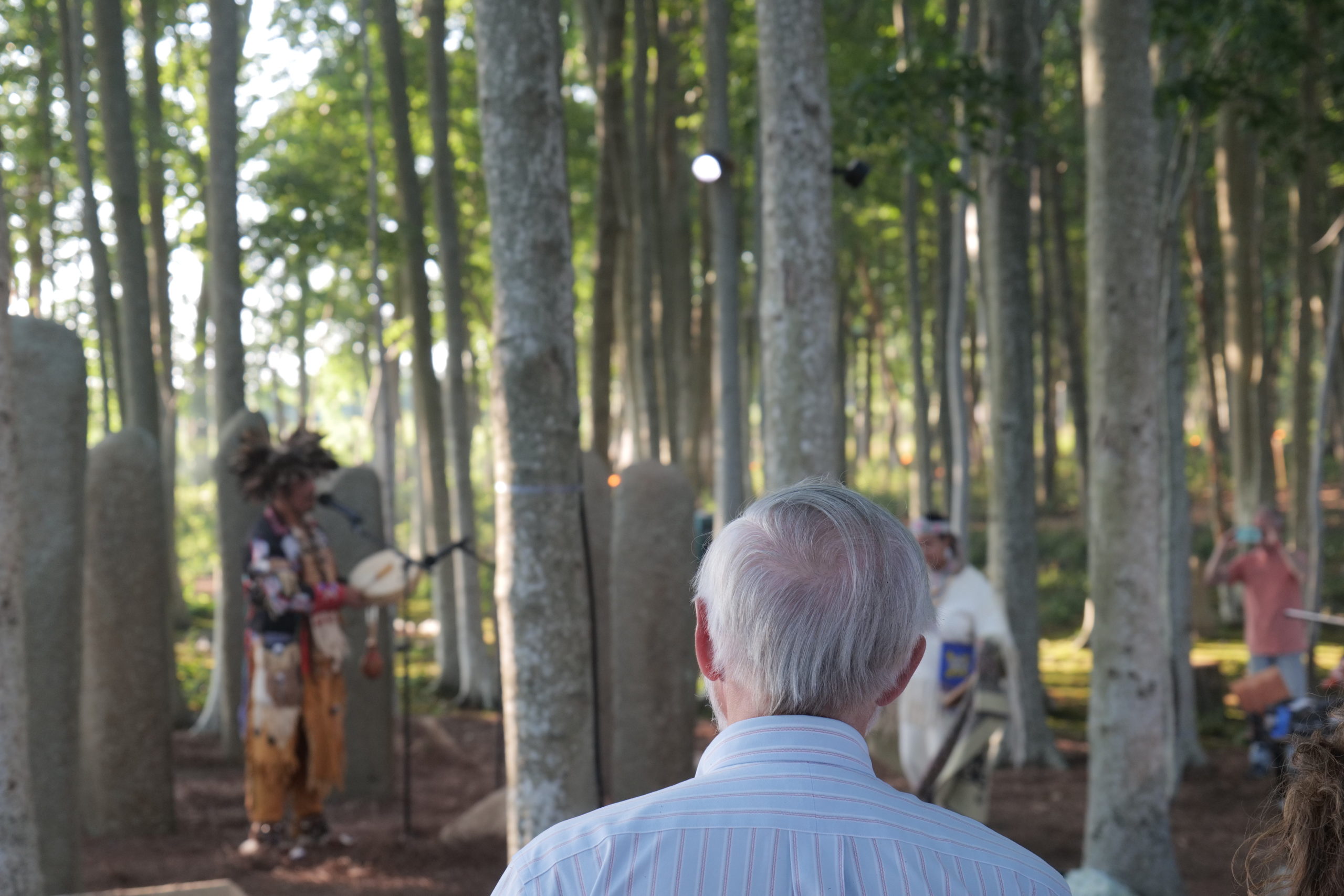 A man watches the performance of 