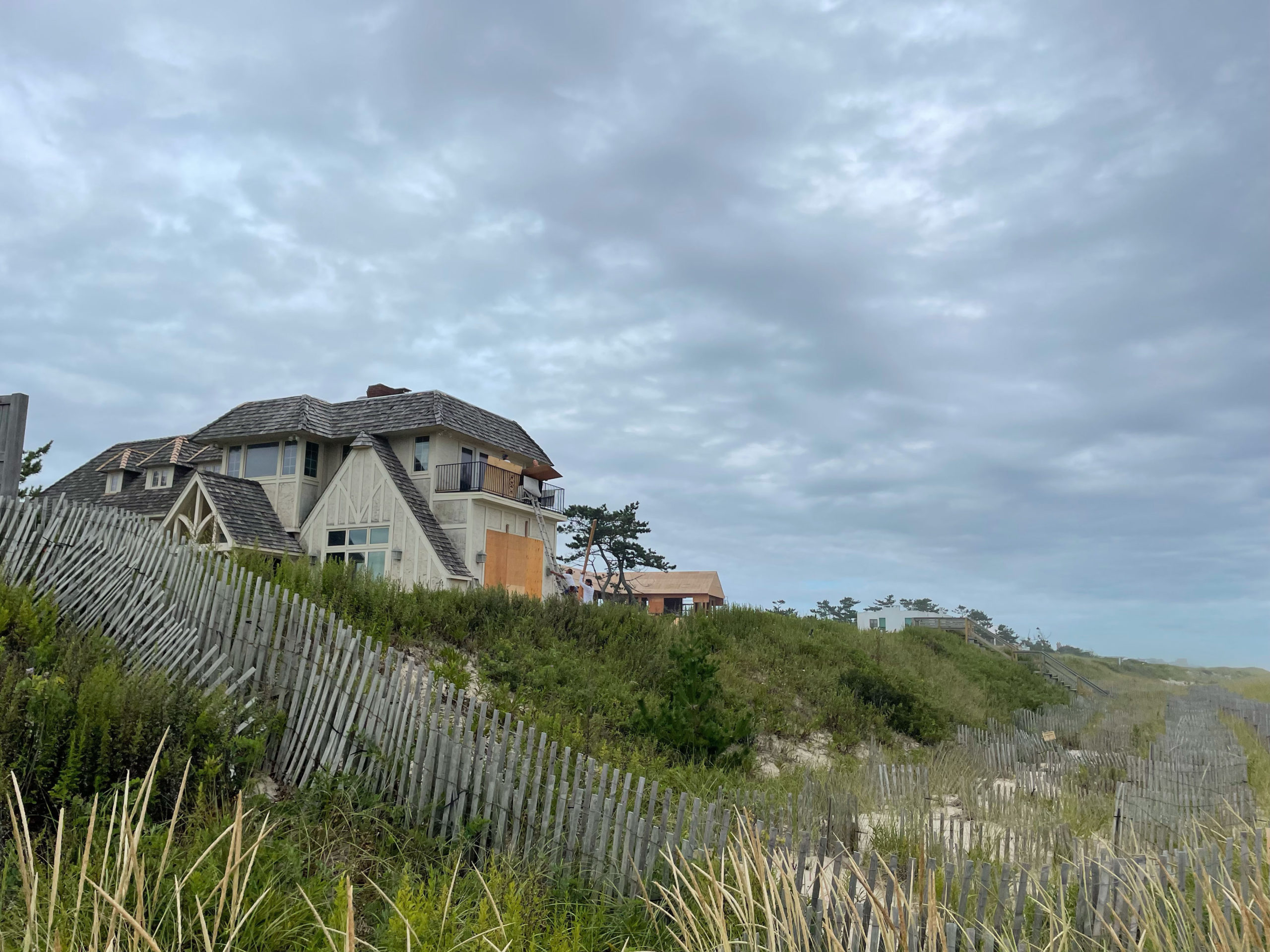 A home is boarded up to the elements along Old town Beach in Southampton.  ALEC GIUFURTA