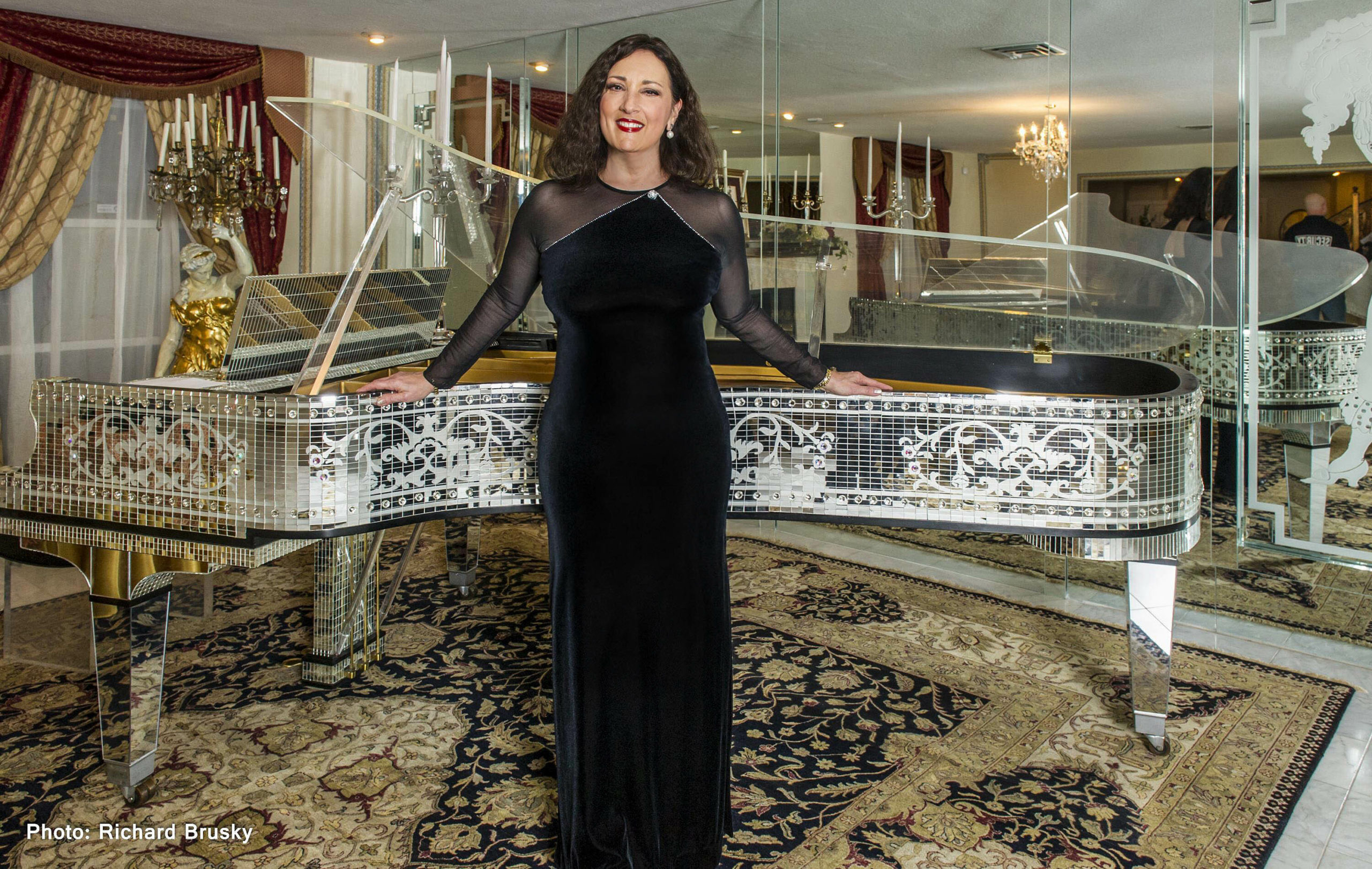 Cristina Fontanelli with Liberace's piano.