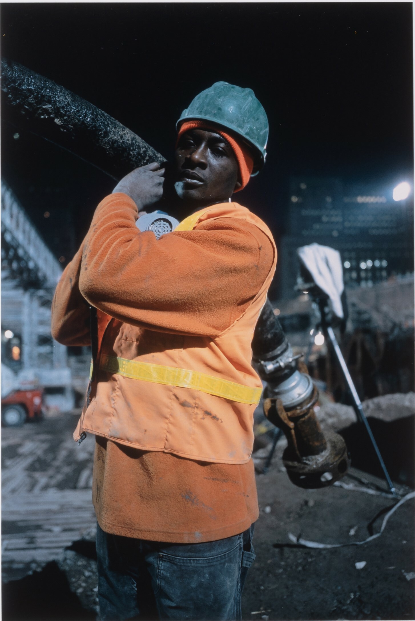 Worker Carrying Pipe, 2002.
