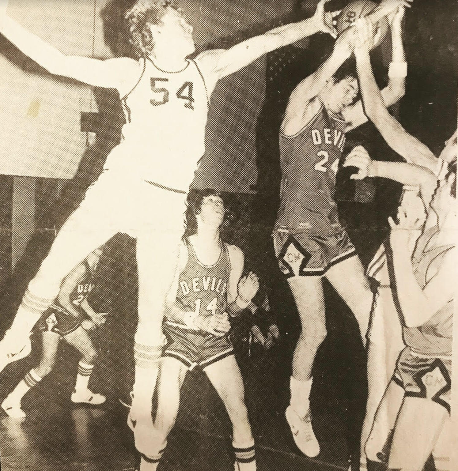 Art Jones playing basketball, he attended Hamilton College on a basketball scholarship.