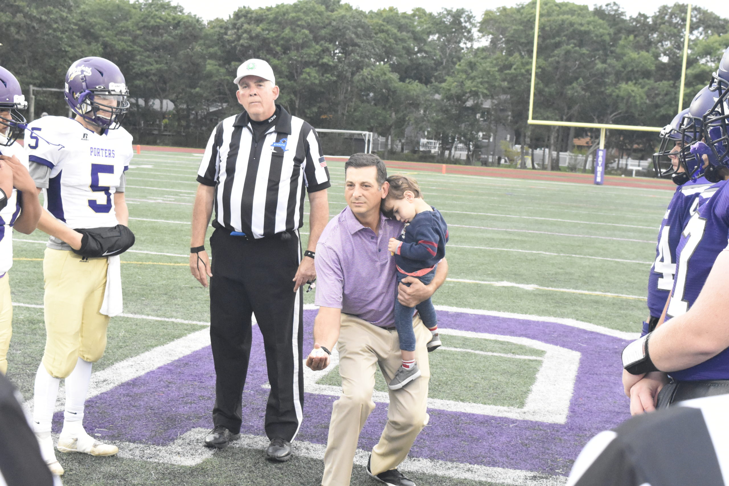 Hampton Bays alum Evan Hillen did the coin toss prior to Friday's football game.
