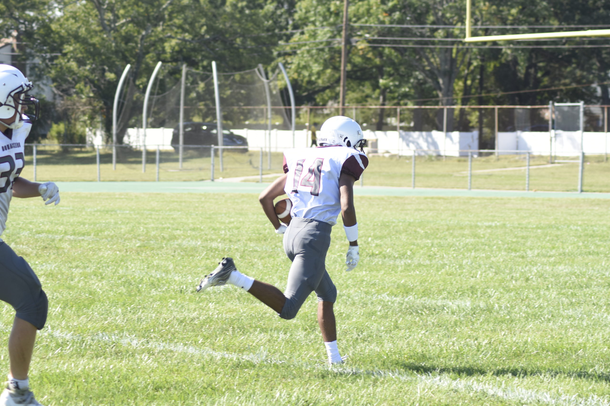 East Hampton's Aryan Chugh scampers into the end zone for a touchdown right before halftime.