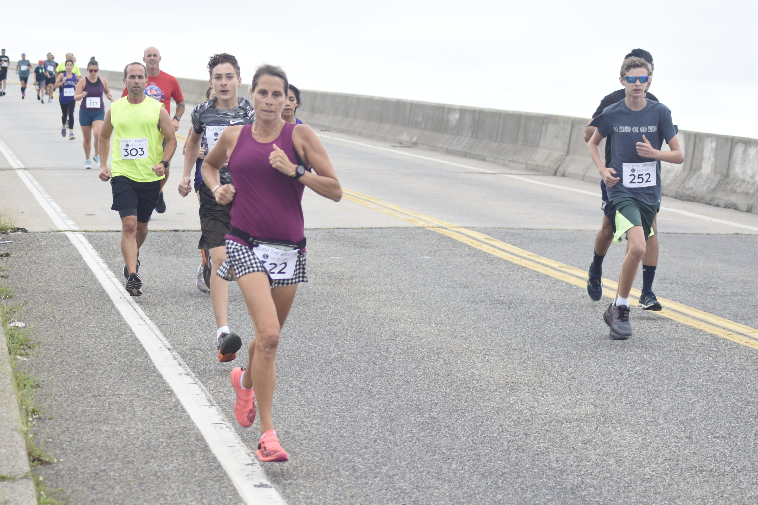 Runners make their descent over Ponquogue Bridge on Saturday morning for the Over The Bridge 10K and 5K races.