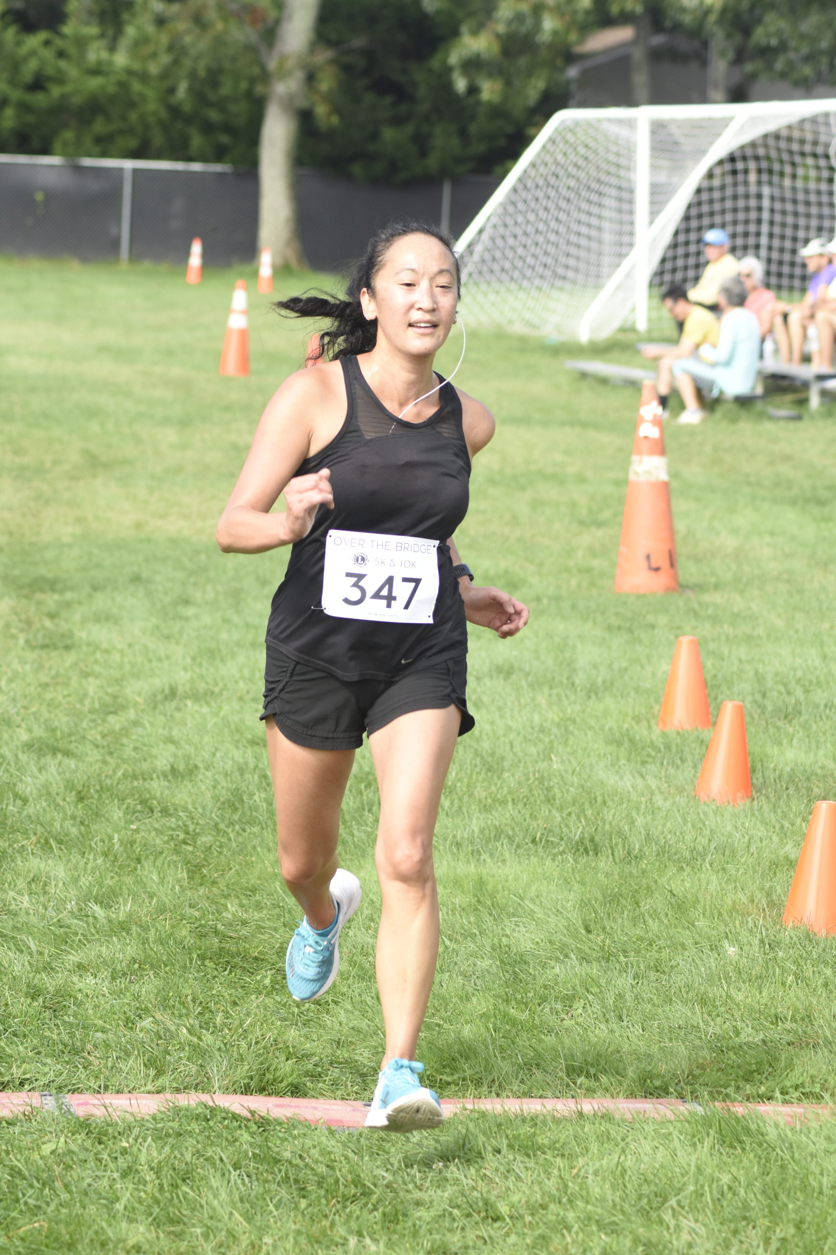 Angela Kim of Manorville placed third among women in the 10K.