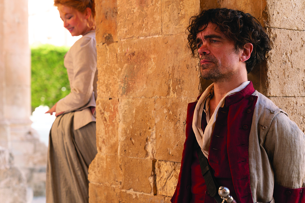 Haley Bennett stars as Roxanne and Peter Dinklage as Cyrano in Joe Wright’s 