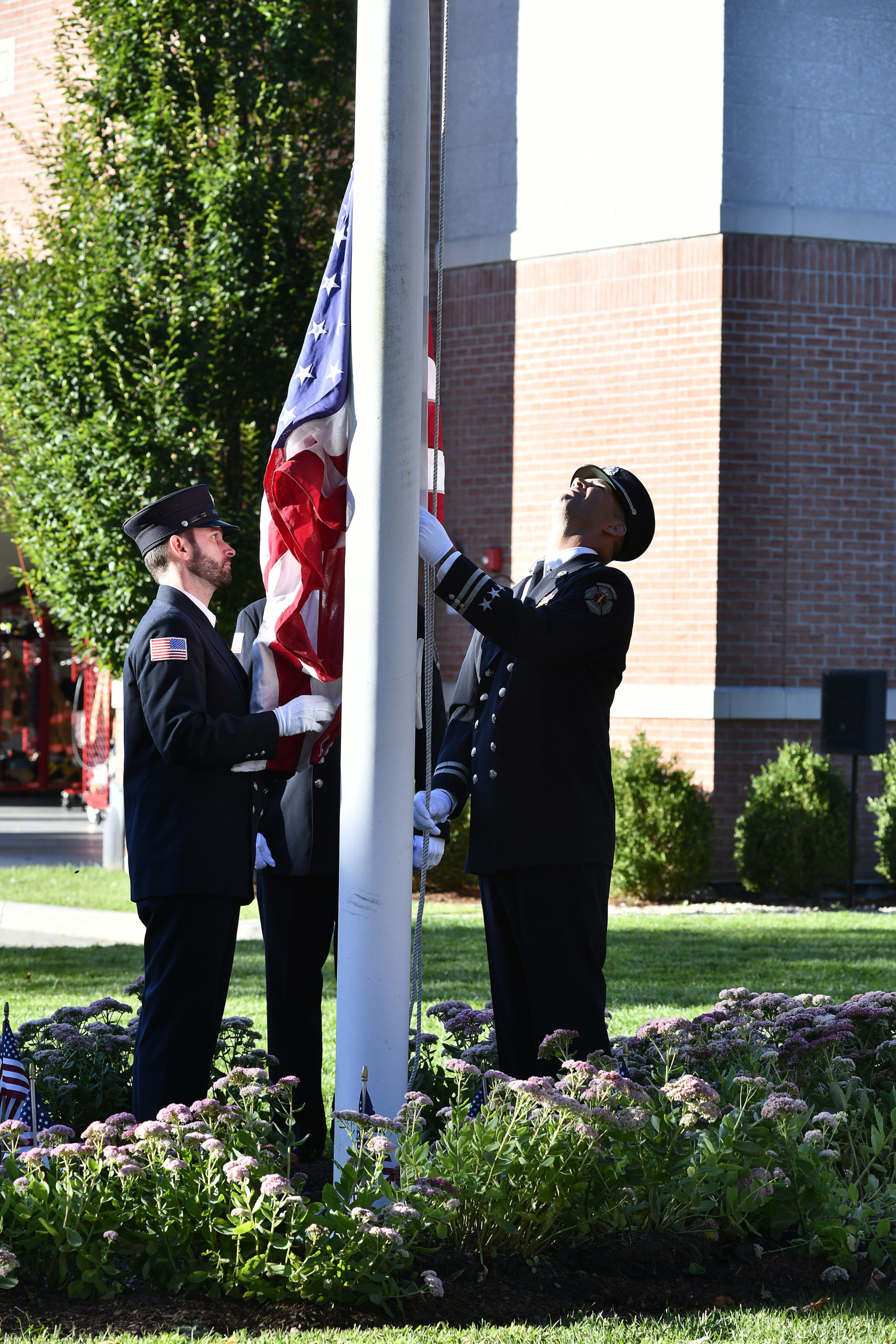 The Color Guard presents and raises the flag at the Southampton Fire Department ceremony on Saturday.