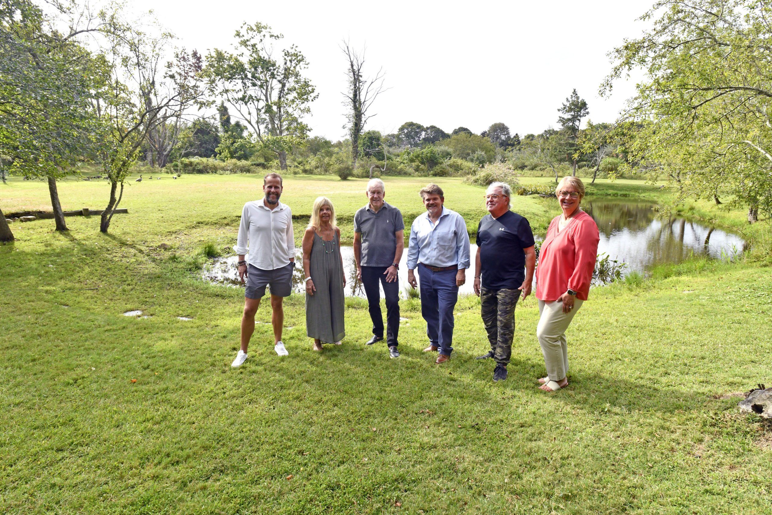 North Haven Village Trustee Claas Abraham; Deputy Mayor E. Dianne Skilbred; Mayor Jeffrey Sander; Southampton Town Councilman Tommy John Schiavoni; and village trustees Chris Fiore and Terie Diate at the former Lovelady Powell property on Sunset Beach road in North Haven.  DANA SHAW