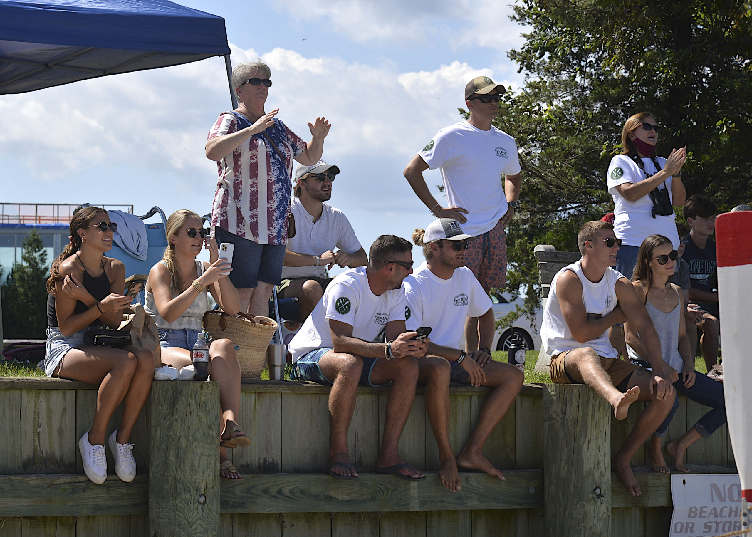 The crowd at Windmill Beach cheers on the whaleboat racers.  KYRIL BROMLEY