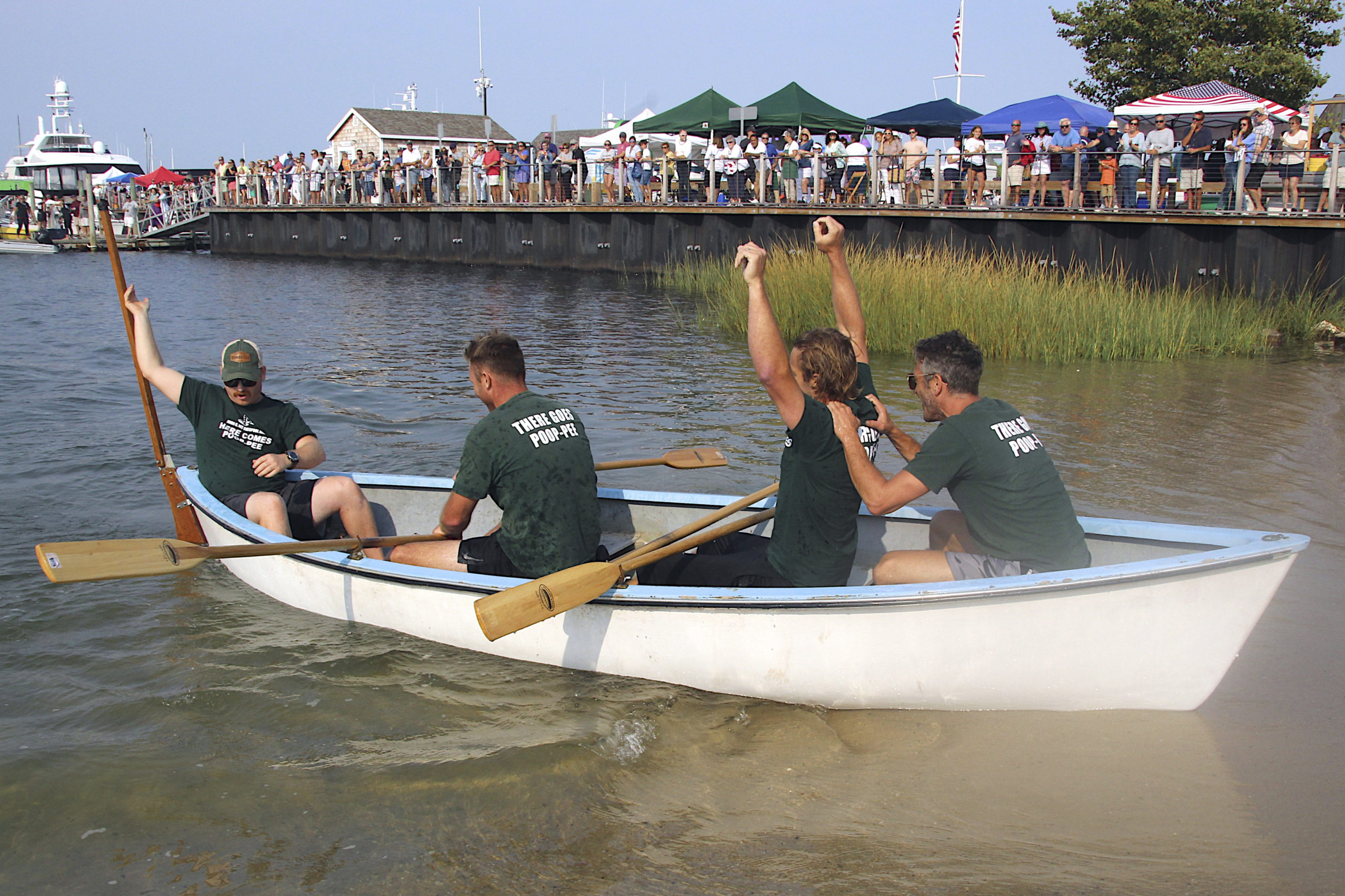 The champion men’s whaleboat team from John K. Ott Cesspool Services included, from left to right, Jeff Greenwald, Brian O’Sullivan, Pete Finelli, Eric Bramoff and Kevin O’Brien Jr.  KYRIL BROMLEY