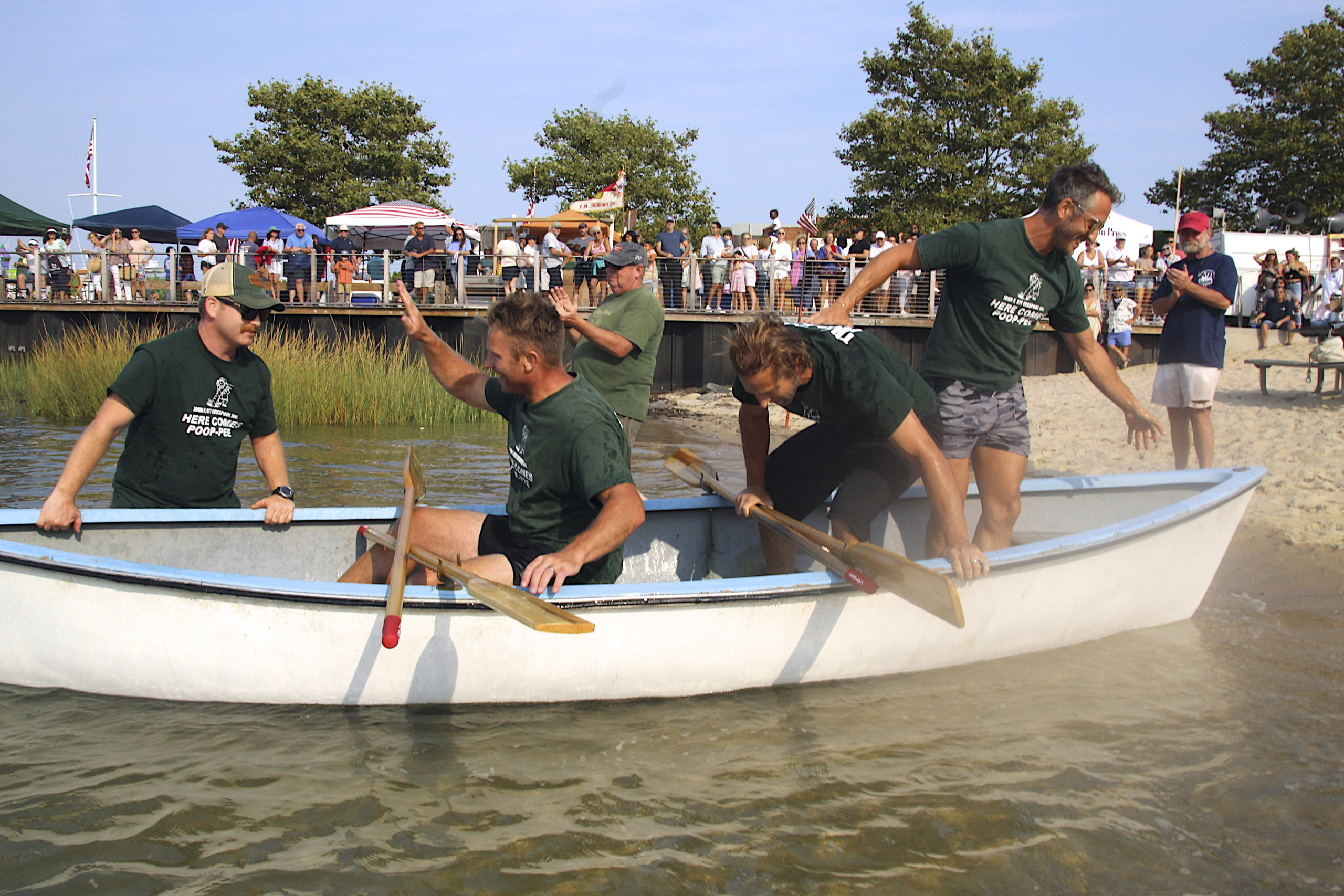 The champion men’s whaleboat team from John K. Ott Cesspool Services included, from left to right, Jeff Greenwald, Brian O’Sullivan, Pete Finelli, Eric Bramoff and Kevin O’Brien Jr.   KYRIL BROMLEY