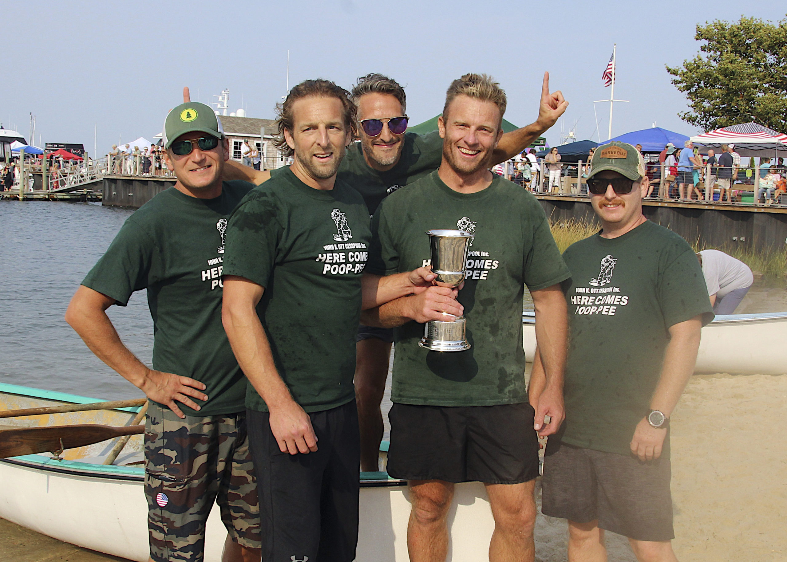 The champion men’s whaleboat team from John K. Ott Cesspool Services included, from left to right, Jeff Greenwald, Brian O’Sullivan, Pete Finelli, Eric Bramoff and Kevin O’Brien Jr.    KYRIL BROMLEY