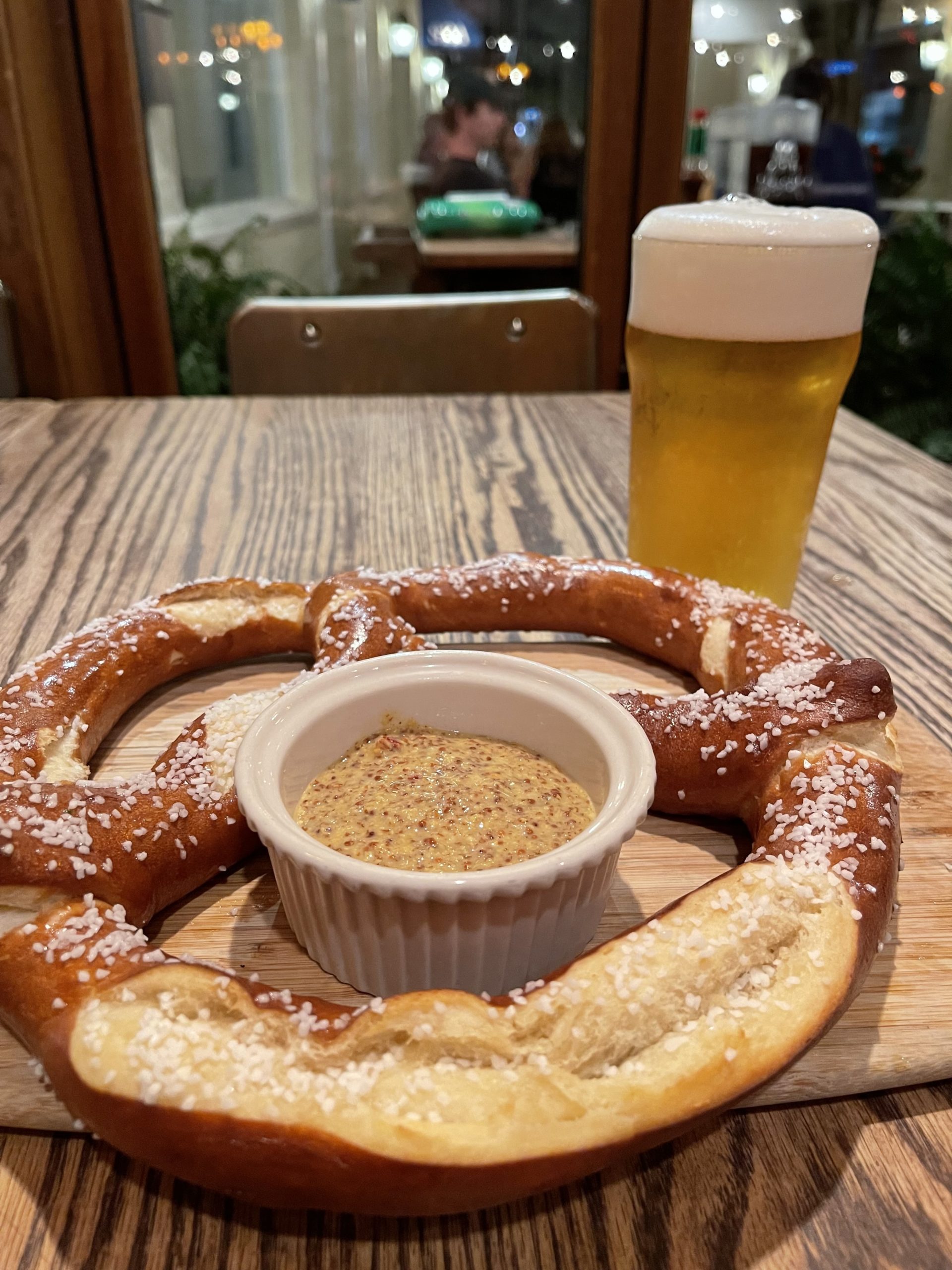 Enjoy a Bavarian pretzel and a beer at Rowdy Hall for Oktoberfest.