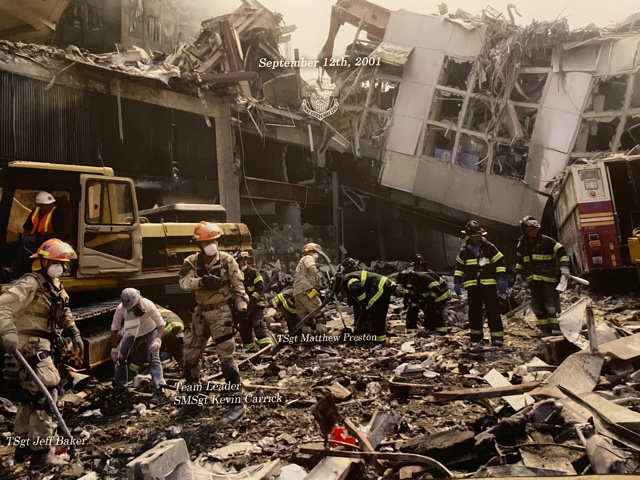 Kevin Carrick, third from left, at Ground Zero on September 12, 2001.   COURTESY KEVIN CARRICK