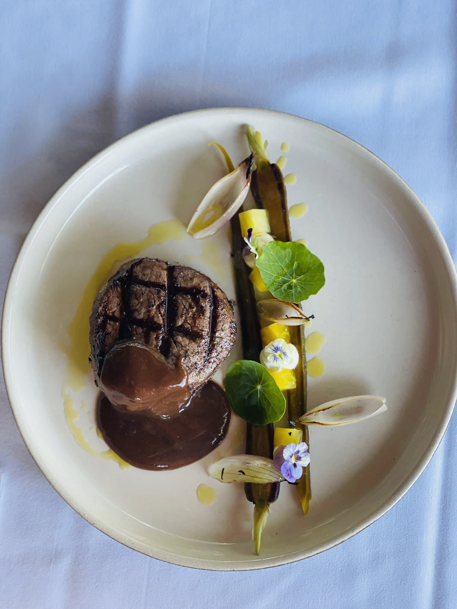 Japanese Wagyu with pearl onions and baby corn, as part of the R.AIRE dining experience at The Hampton Maid in Hampton Bays.