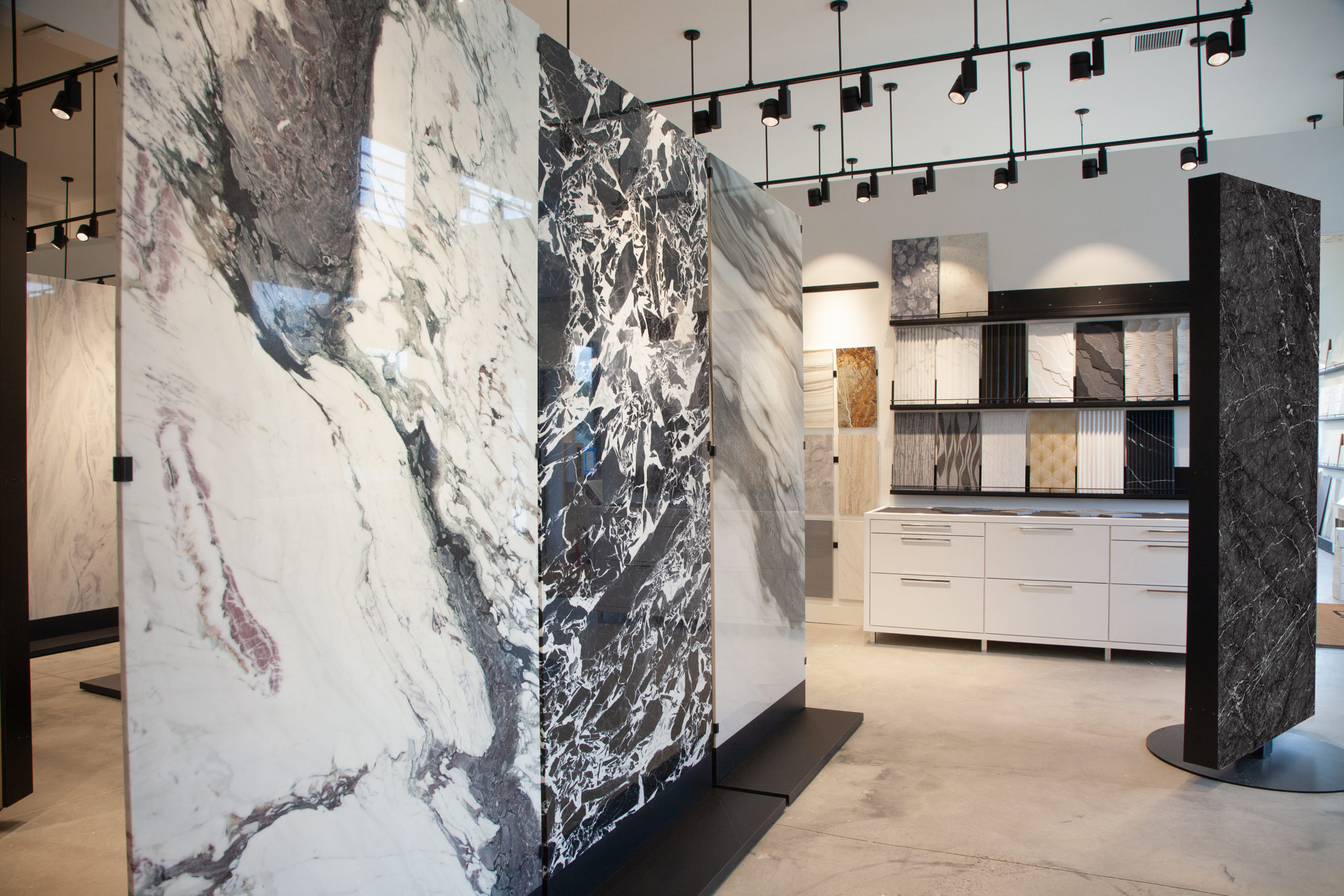 Large-scaled porcelain slabs give clients a better sense of how the product will look in their home.