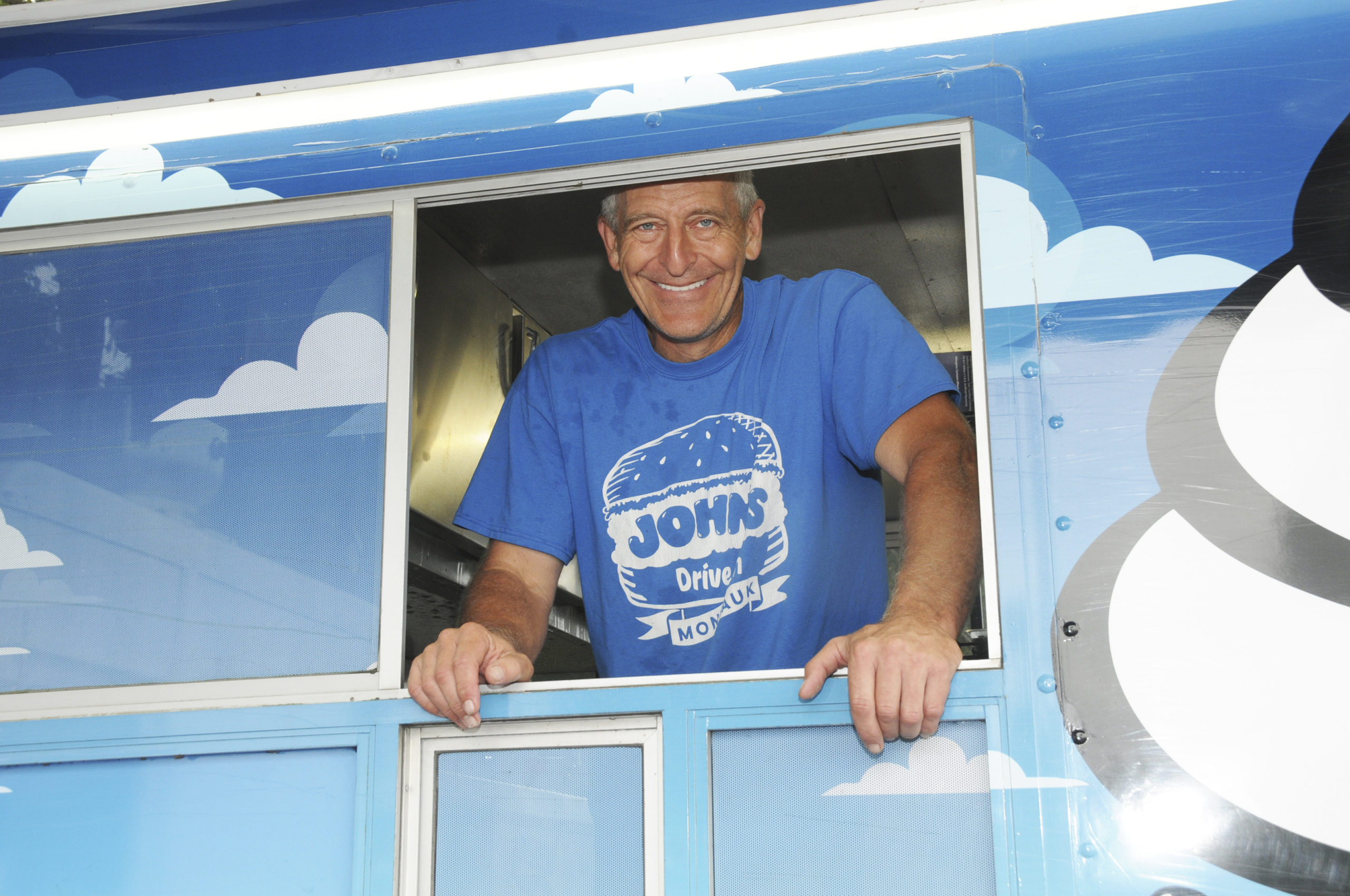 Dave Rutkowski in the John's Drive-In truck at the music festival in Herrick Park.