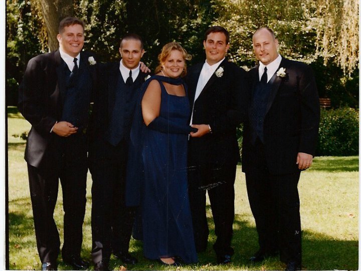John Scharf, far left, with his siblings David, Christine Scharf-Meyer, Jason and Joseph, at Jason’s wedding in September 2000.