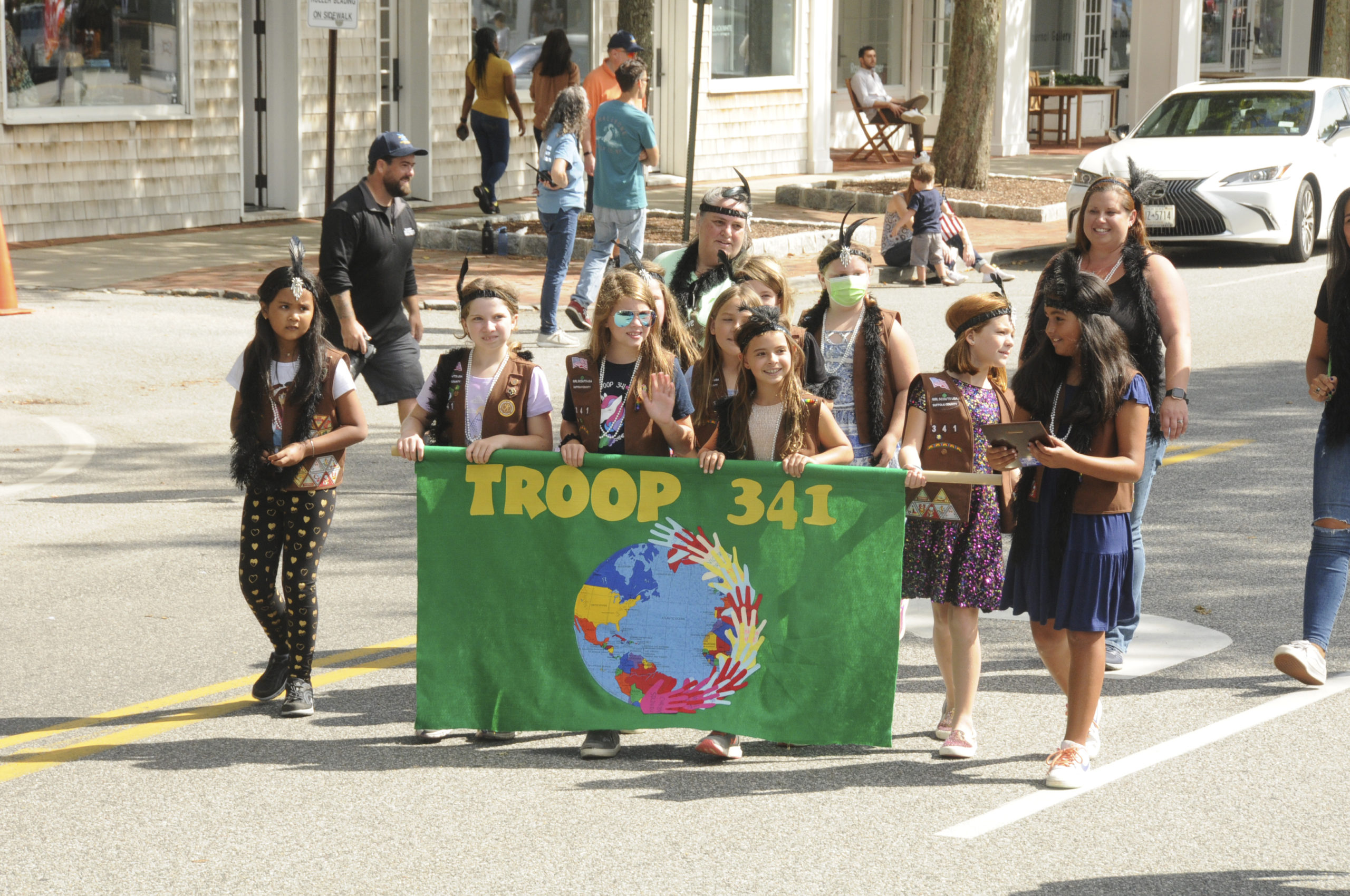 Girl Scout Troop 341 during the parade on Saturday.