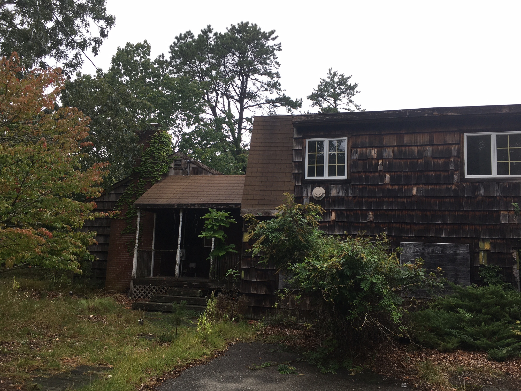 Purchased by the Town of Southampton in 2007, the caretaker's house at Camp Tekakwitha in Hampton Bays, now a zombie house, will be demolished.