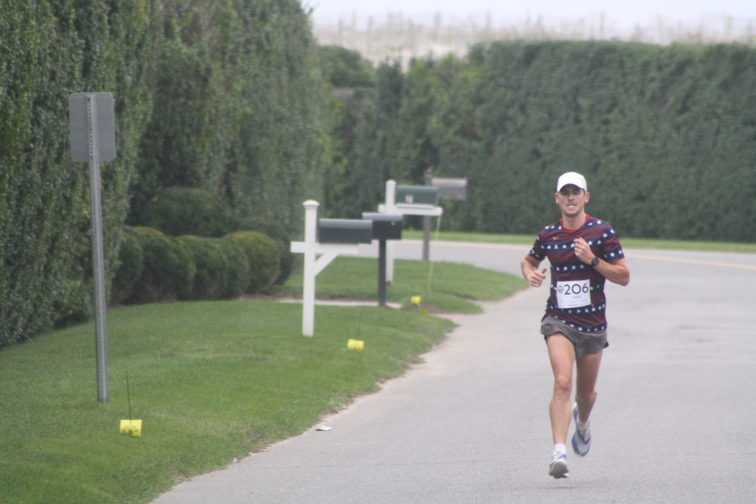 Oz Pearlman, a past winner of both the Firecracker 8K and the Hamptons Marathon, had a huge lead over the field for most of the race and won easily.