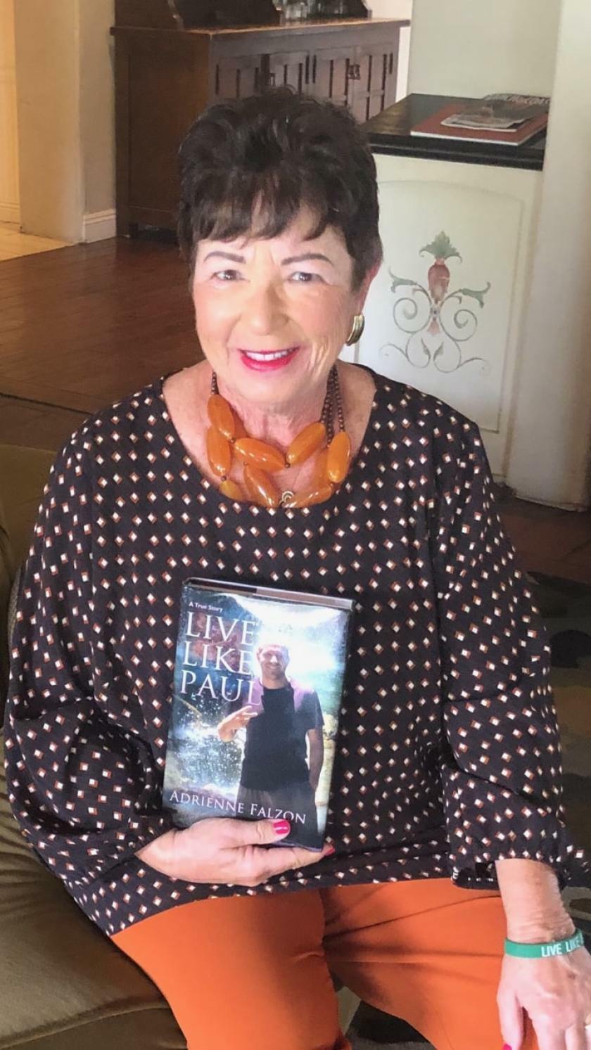 Author Adrienne Falzon with her book 
