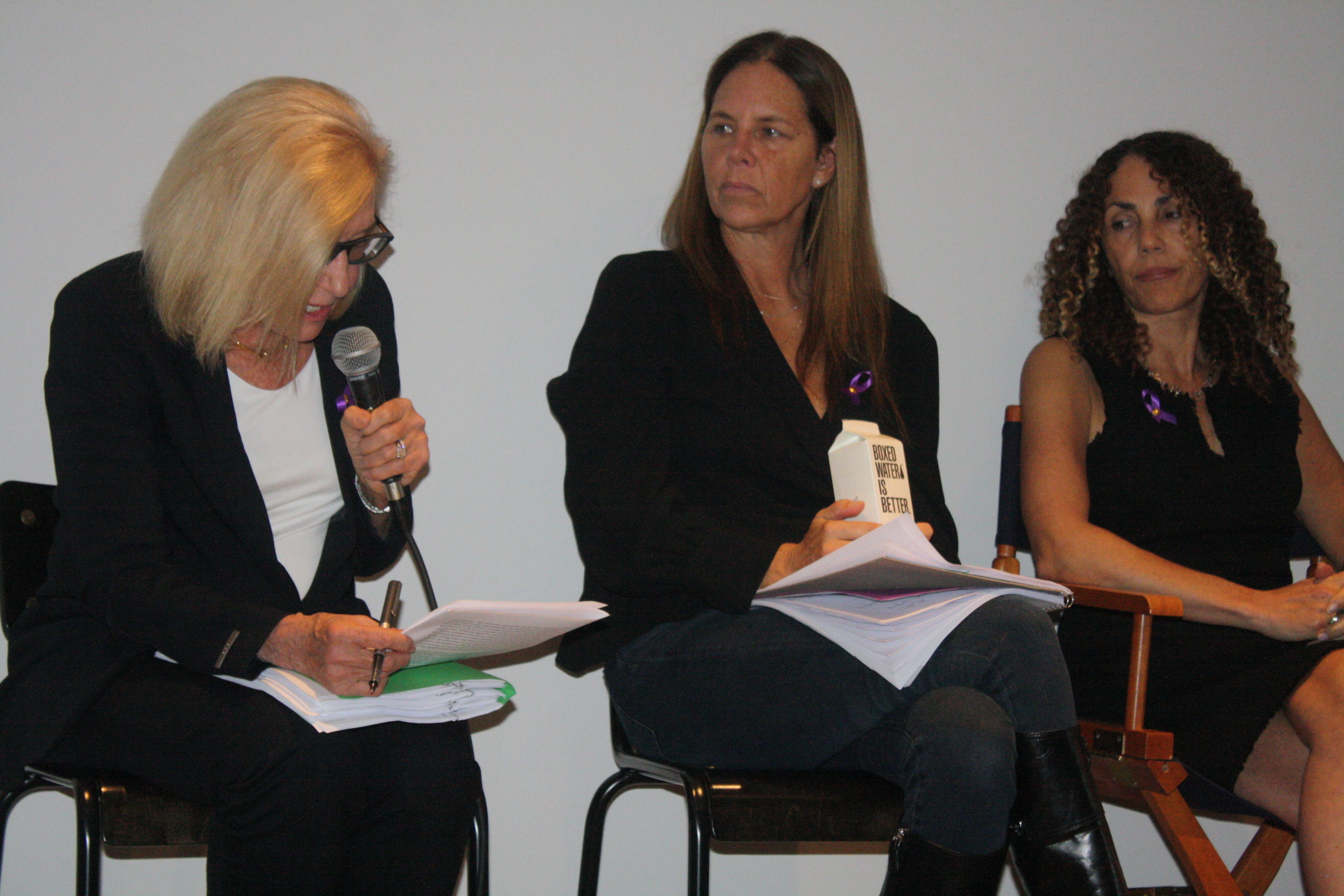 From left, panel moderator Diana Diamond, advocate and survivor Nicole Behrens, and OLA executive director Minerva Perez discussing the issue of domestic violence in the community at a panel discussion at the Sag Harbor Cinema on Sunday evening.