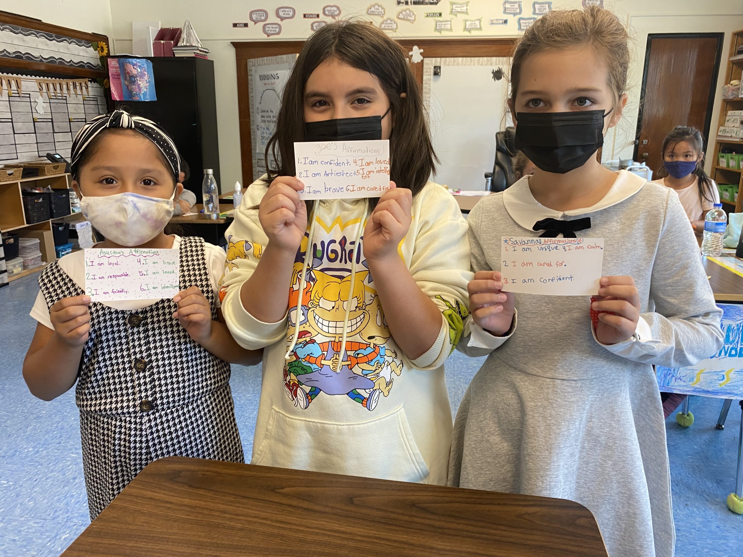 Bridgehampton School fourth-graders, left to right, Asucena Dominguez-Ramos, Zoe Urgiles and Savanna Lillie, with their positive affirmation cards.
