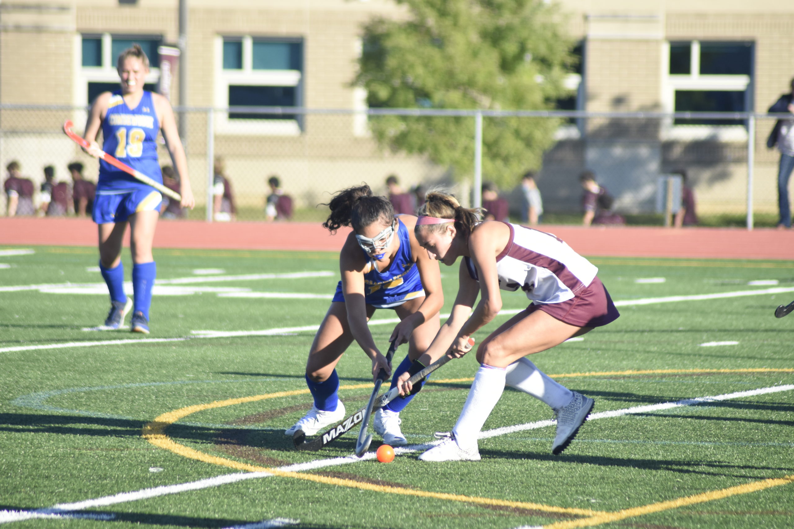 Sophomore Bonacker Emma McGrory steals the ball from a Comsewogue player.