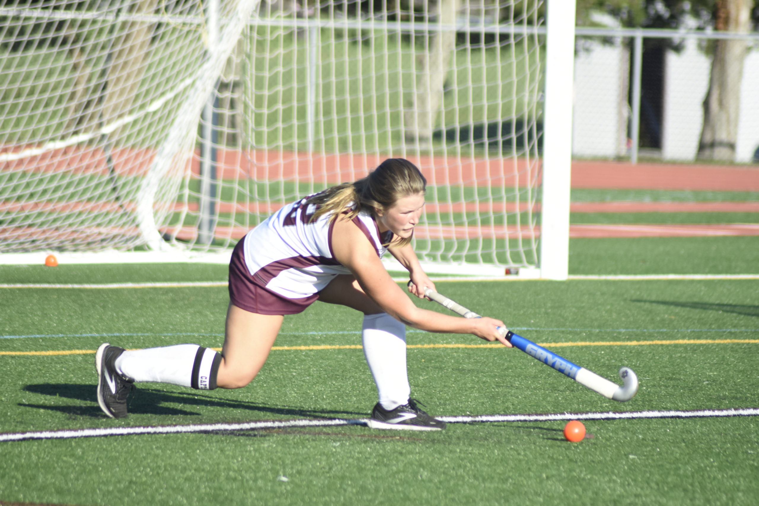 East Hampton senior co-captain Arabella Kuplins inserts the ball for a corner.