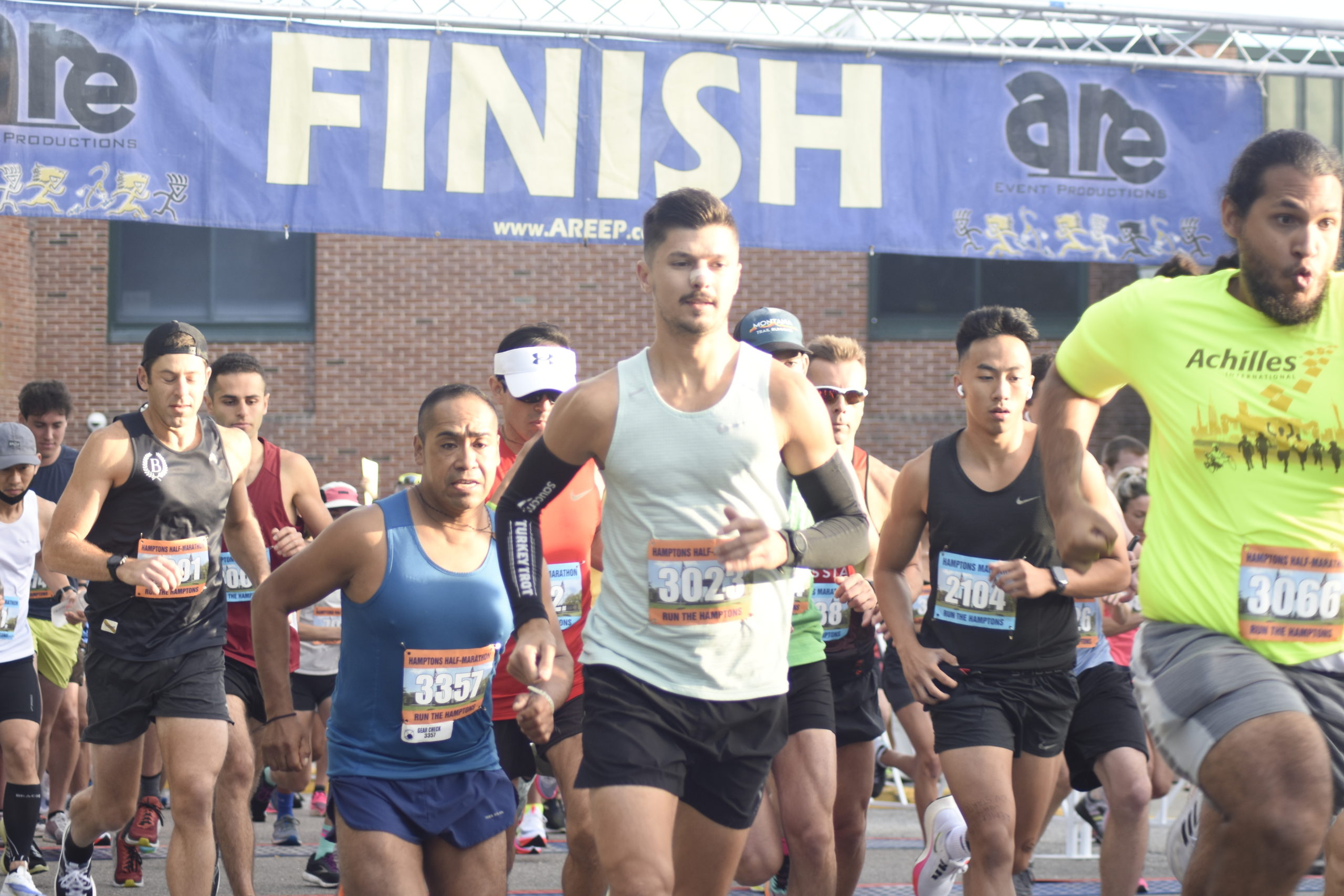 Runners start the Hamptons Marathon and Half Marathon on Saturday morning in Southampton.