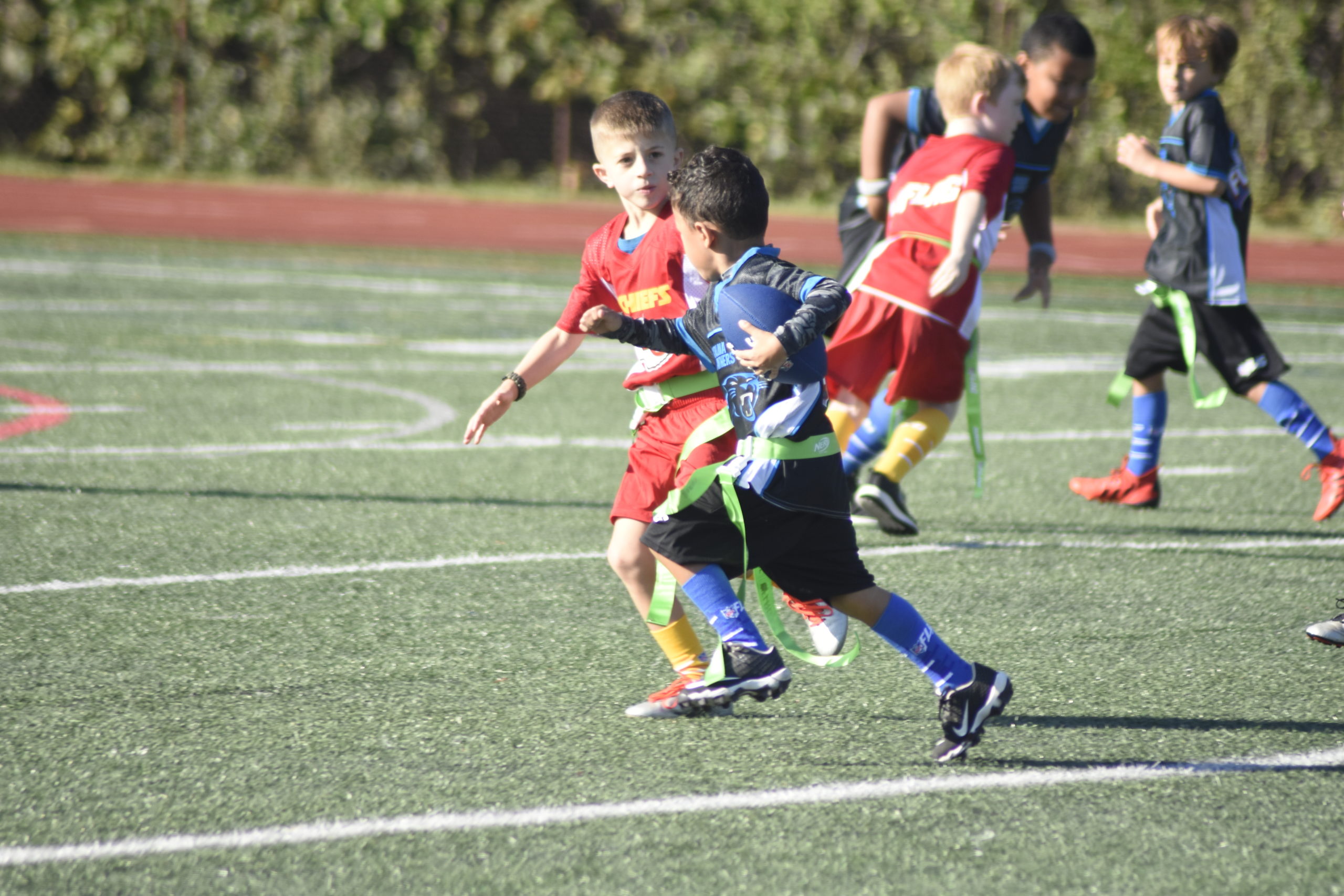 Hampton Bays youth enjoy the very first day of the Baymen Flag Football League on October 3.