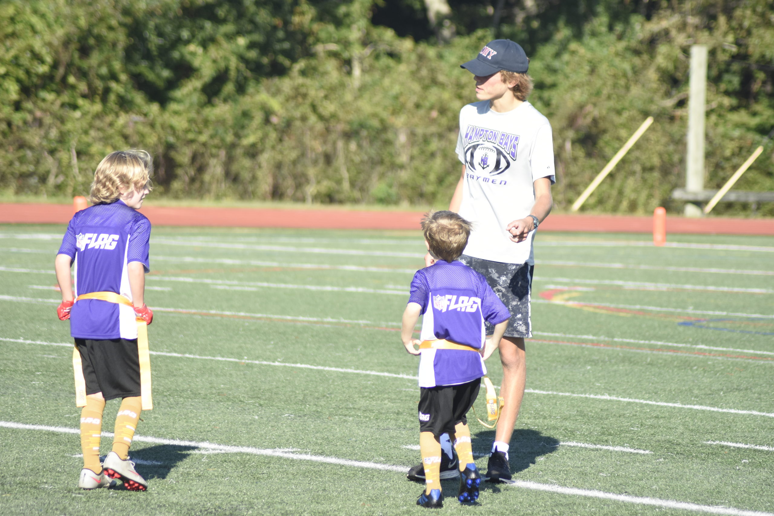 Hampton Bays High School junior Stephen Sutton, a wide receiver and defensive back on the varsity football team, gives some pointers.