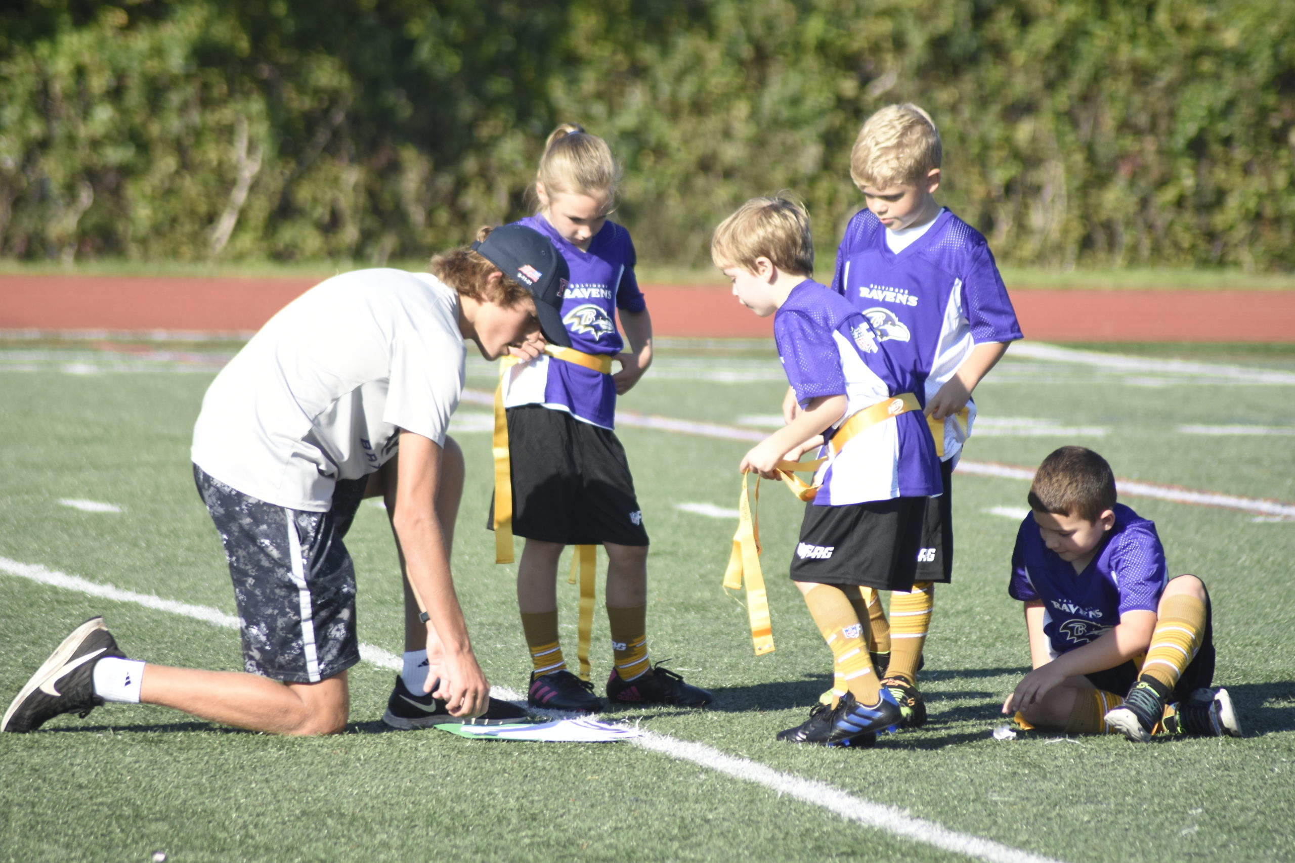 Hampton Bays High School junior Stephen Sutton, a wide receiver and defensive back on the varsity football team, gives some pointers.