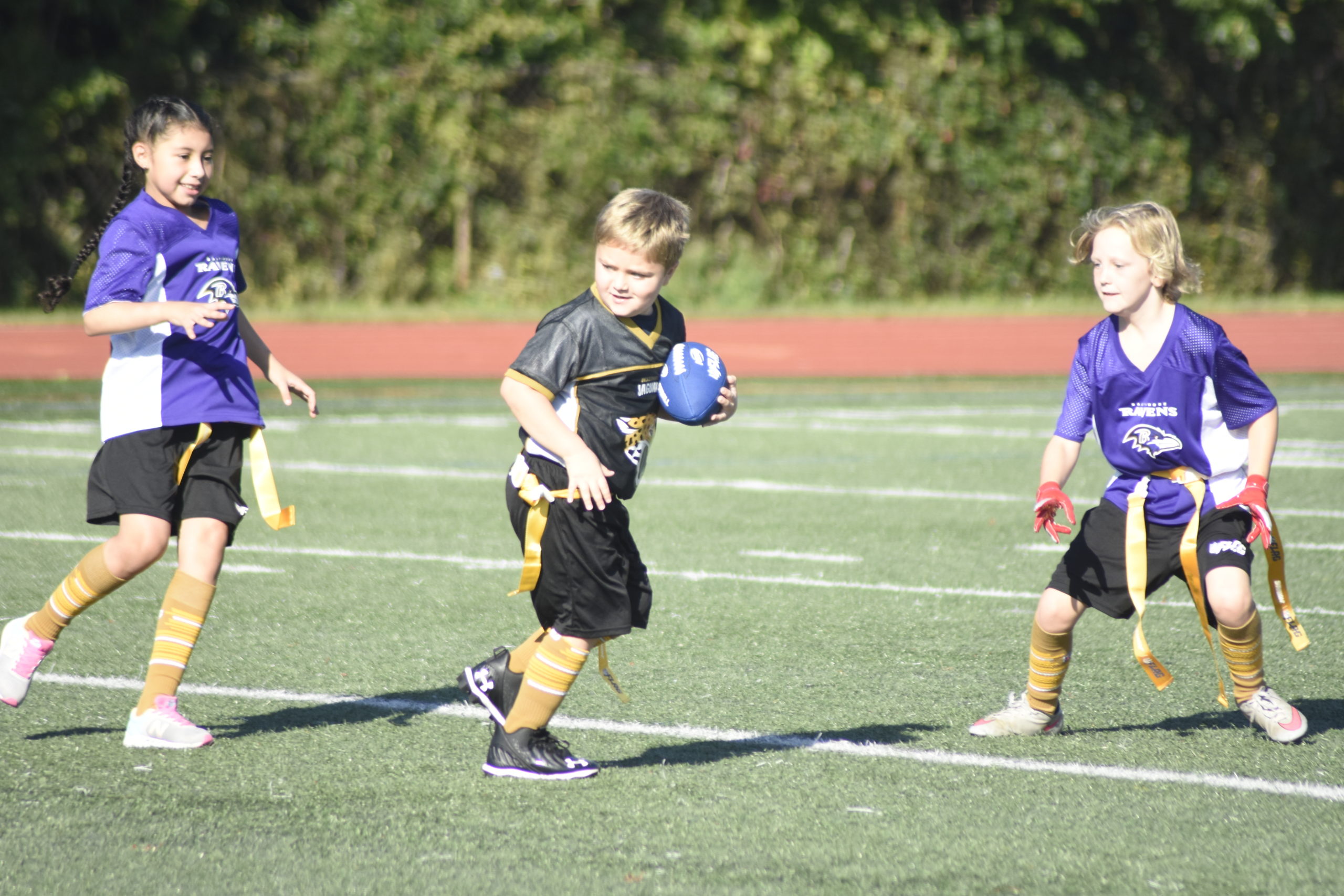 Hampton Bays youth enjoy the very first day of the Baymen Flag Football League on October 3.