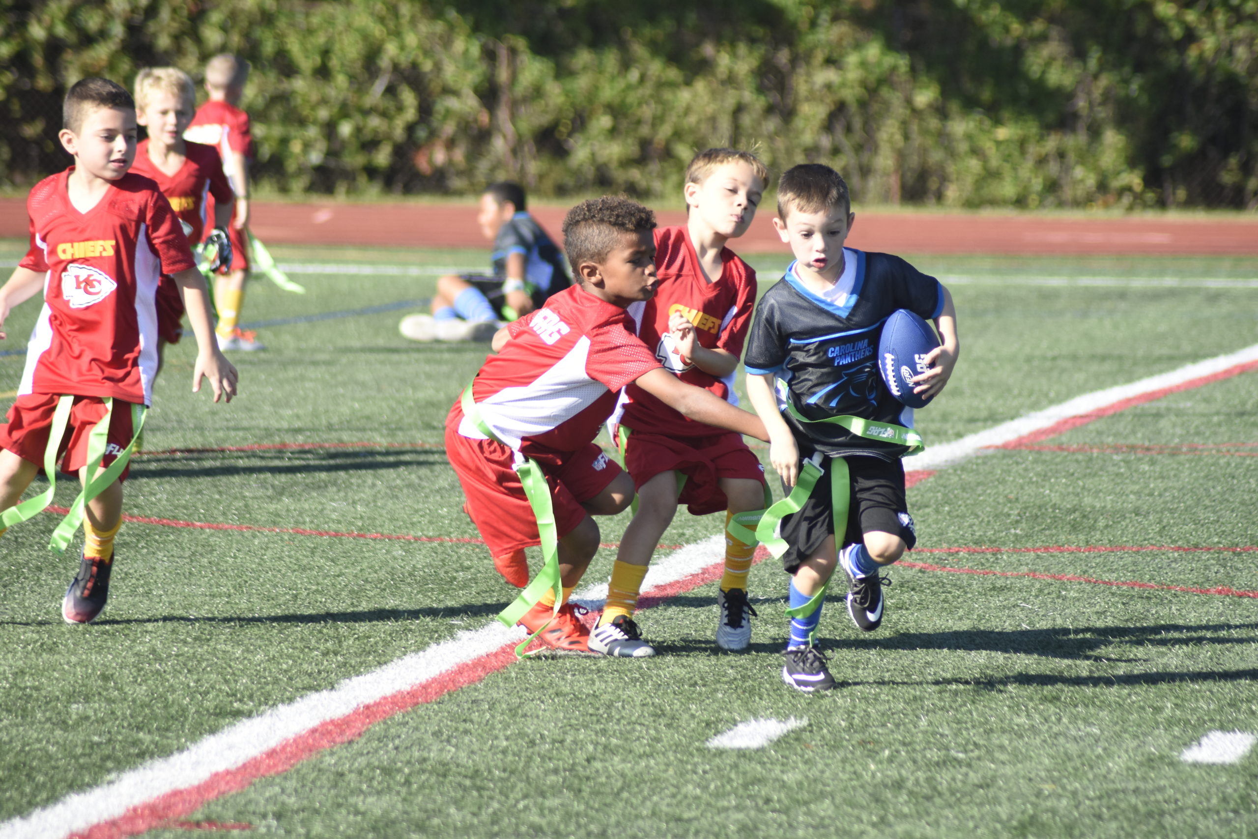 Hampton Bays youth enjoy the very first day of the Baymen Flag Football League on October 3.