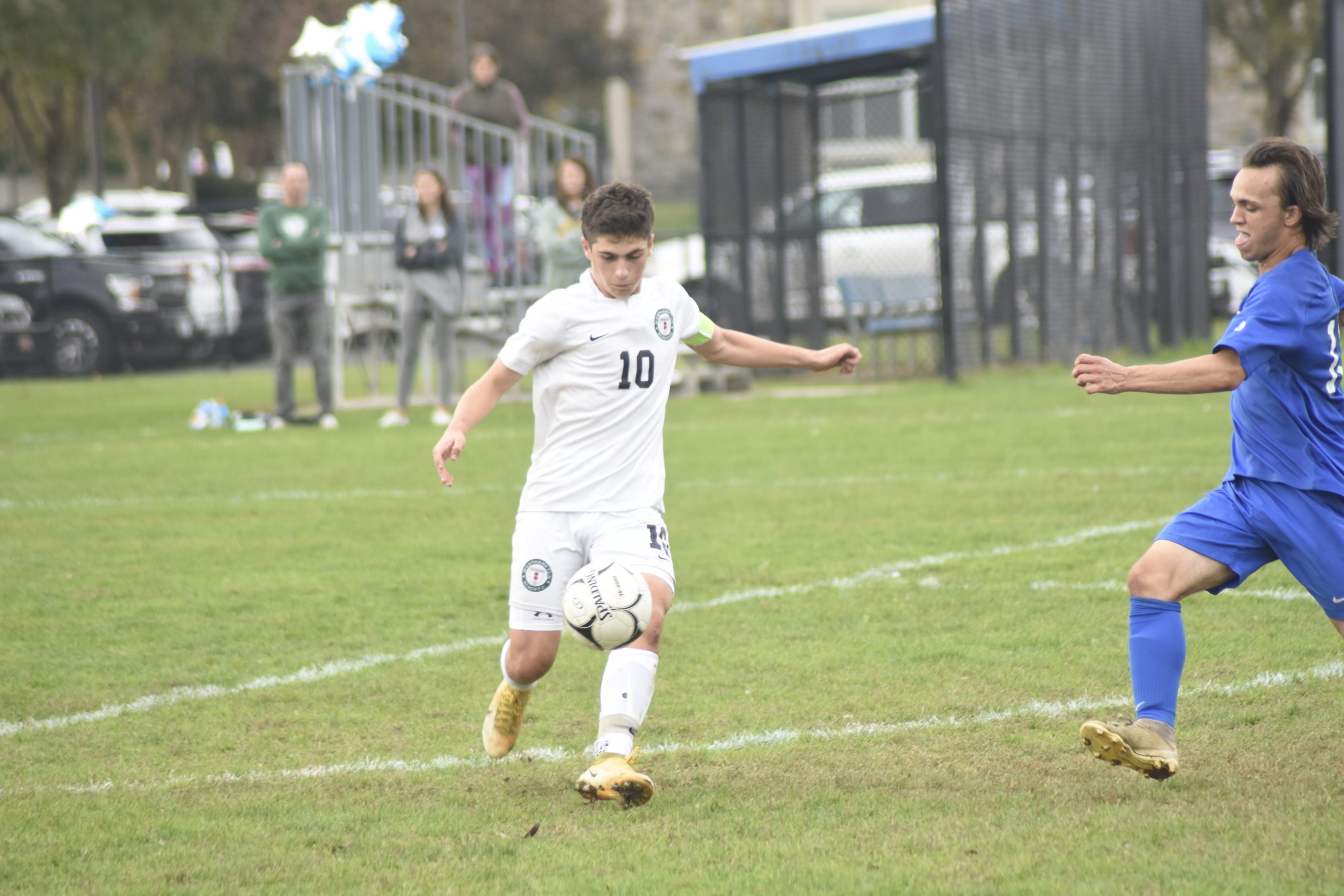 Westhampton Beach senior co-captain Loris Van Vlodrop clears the ball out of his team's defensive end.