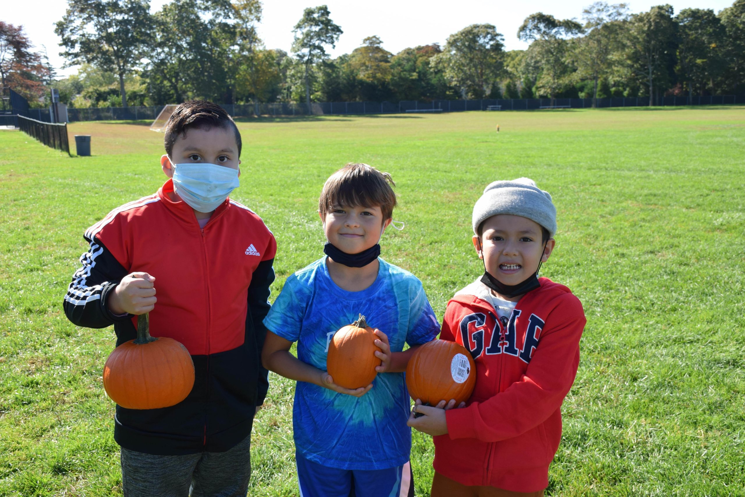 Hampton Bays Elementary School students participated in a pumpkin picking event on October 21. The school field was strewn with pumpkins donated by the Southampton Officers Association and Dan Schmidt of Schmidt’s Market and Produce of Southampton.