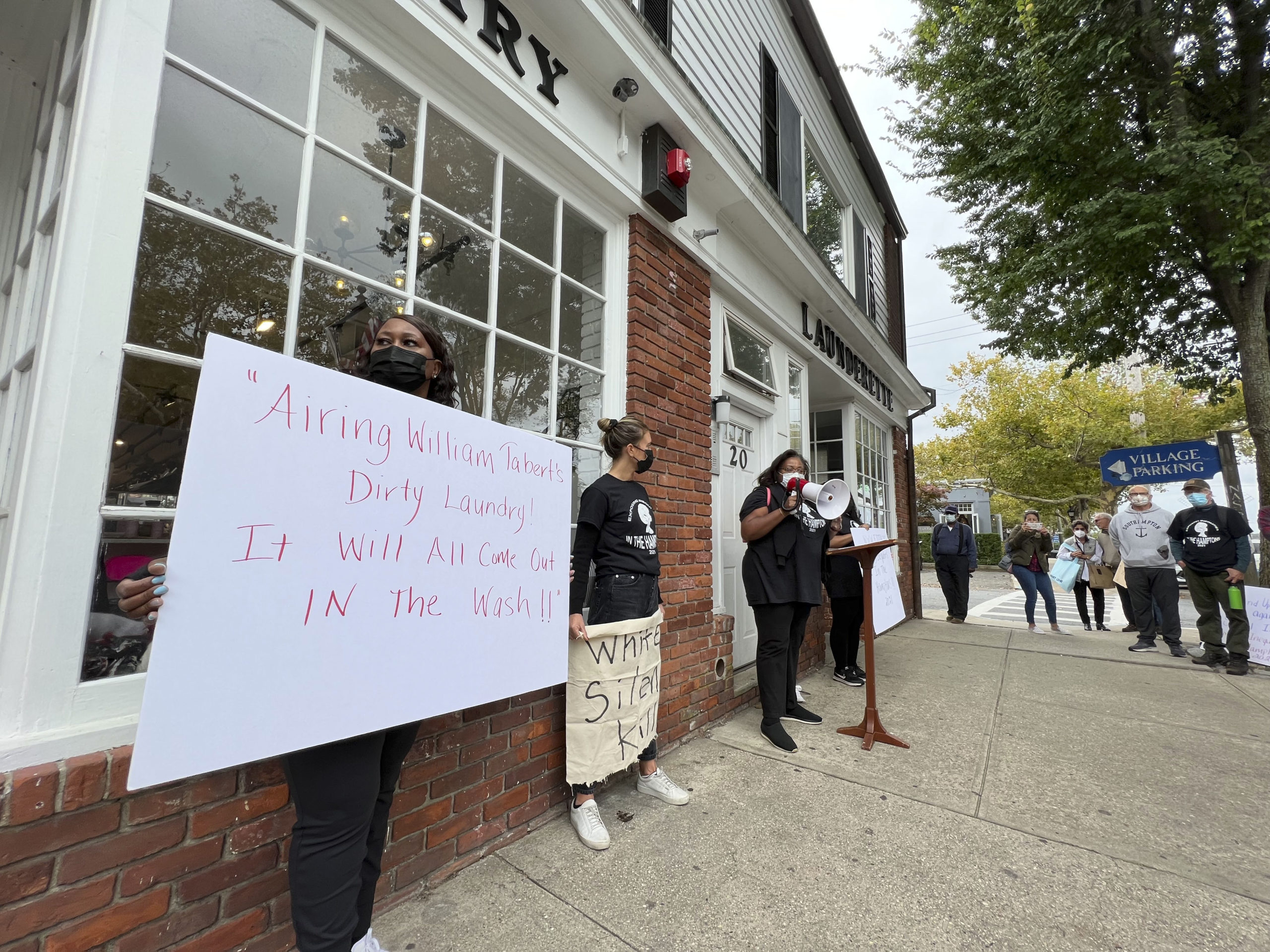 The protest at the Sag Harbor Launderette on Saturday.  DANA SHAW