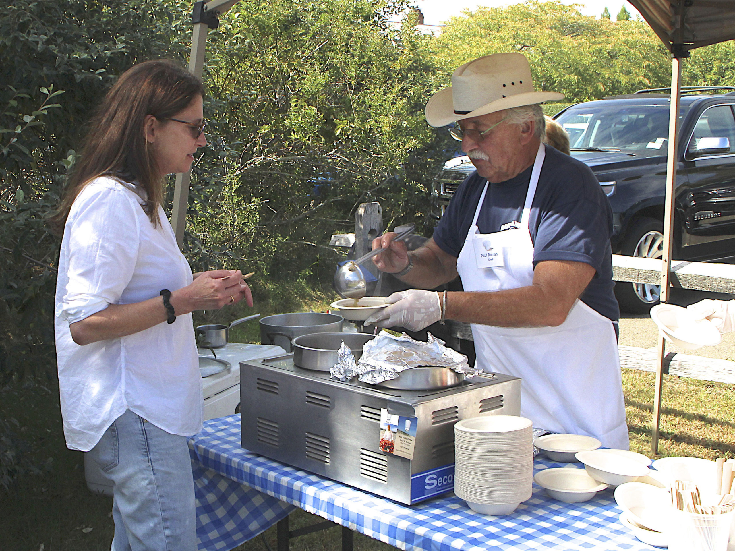 Paul Roman serves up some chowder.