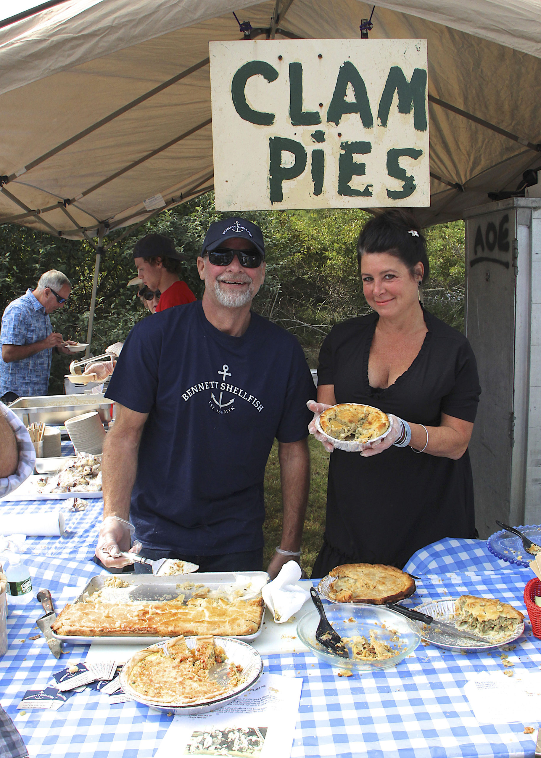 Bill Bertha and Tina Landi with the clam pies.