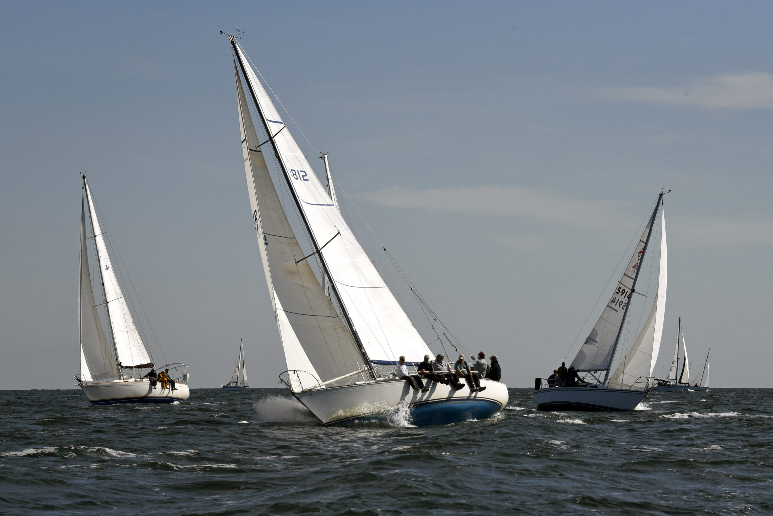 From left to right: Dough Davies’ Cal 32 Gypsy Moon of Port Jeff Yacht Club), George Martin’s C&C 35 Osprey out of Breakwater and Southampton Yacht Club, Kent Layton’s Catalina 27 Emerald Eyes of Southold Yacht Club minutes after rounding Jessup Neck.