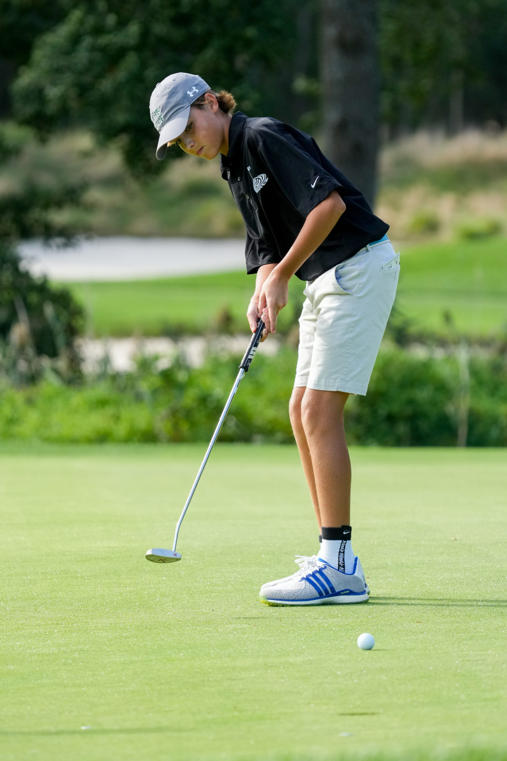 Owen Jessup putts for Westhampton Beach at Noyac Golf Club on September 23.